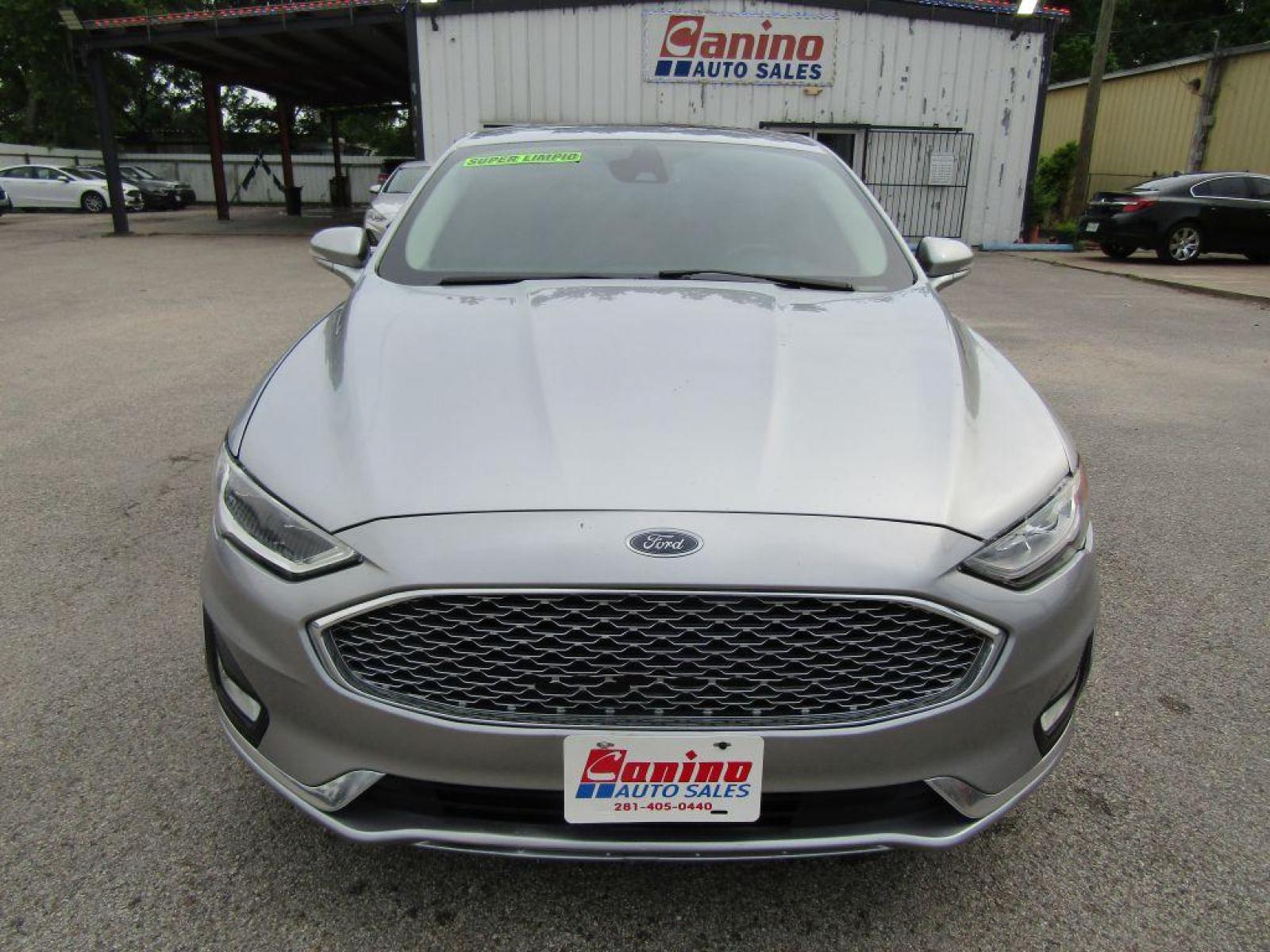 2020 SILVER FORD FUSION** TITANIUM (3FA6P0K9XLR) with an 2.0L engine, Automatic transmission, located at 830 E. Canino Rd., Houston, TX, 77037, (281) 405-0440, 38.358219, -81.729942 - Photo #0