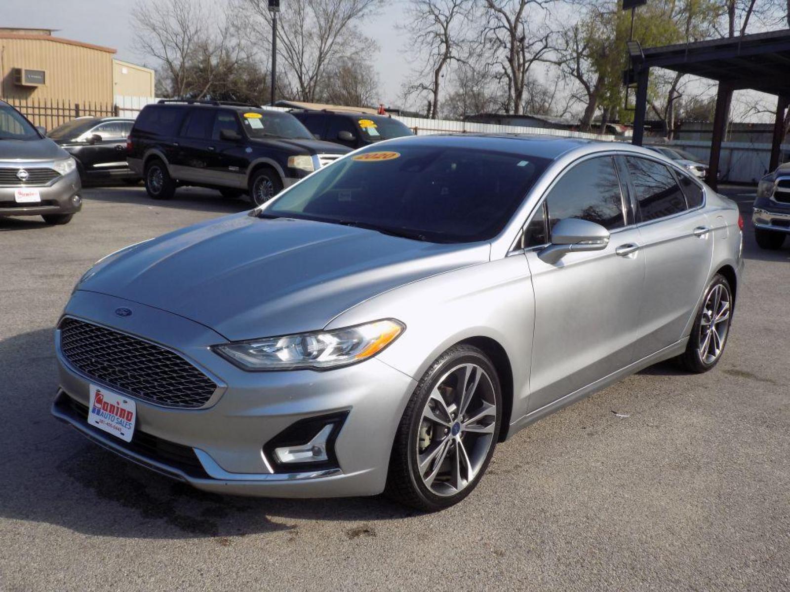 2020 SILVER FORD FUSION** TITANIUM (3FA6P0K9XLR) with an 2.0L engine, Automatic transmission, located at 830 E. Canino Rd., Houston, TX, 77037, (281) 405-0440, 38.358219, -81.729942 - Photo #1