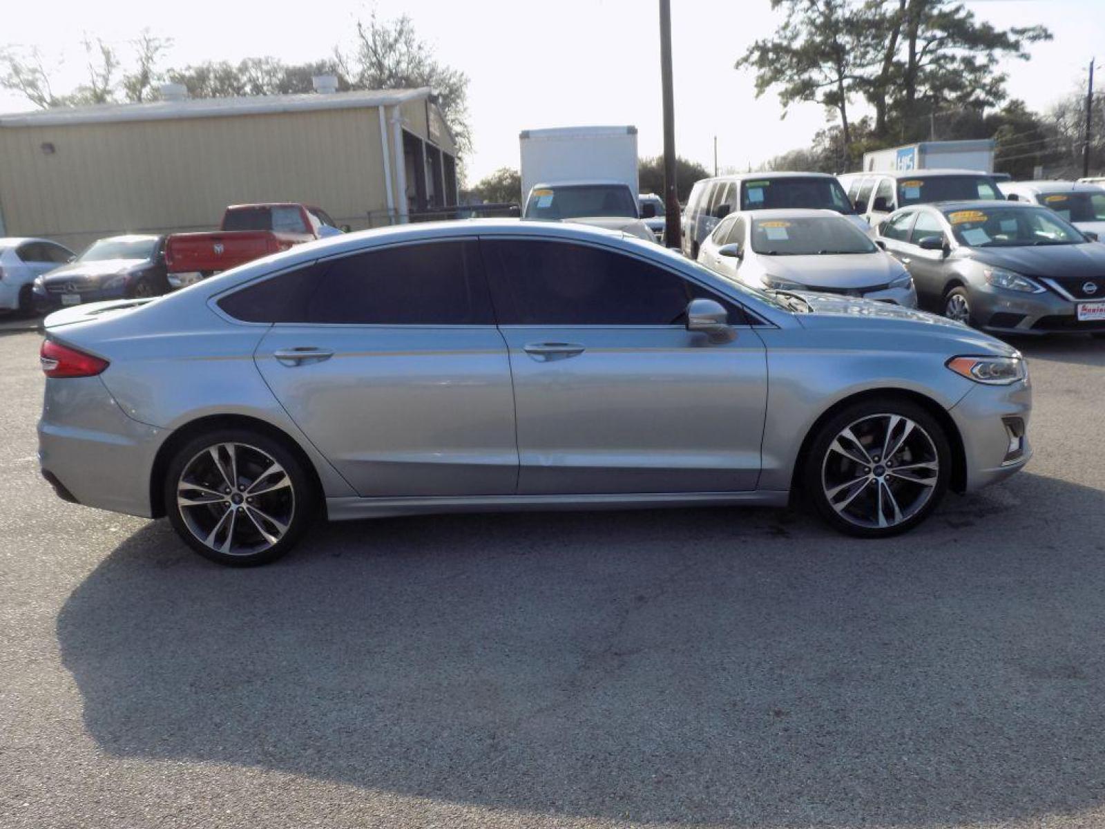 2020 SILVER FORD FUSION** TITANIUM (3FA6P0K9XLR) with an 2.0L engine, Automatic transmission, located at 830 E. Canino Rd., Houston, TX, 77037, (281) 405-0440, 38.358219, -81.729942 - Photo #6