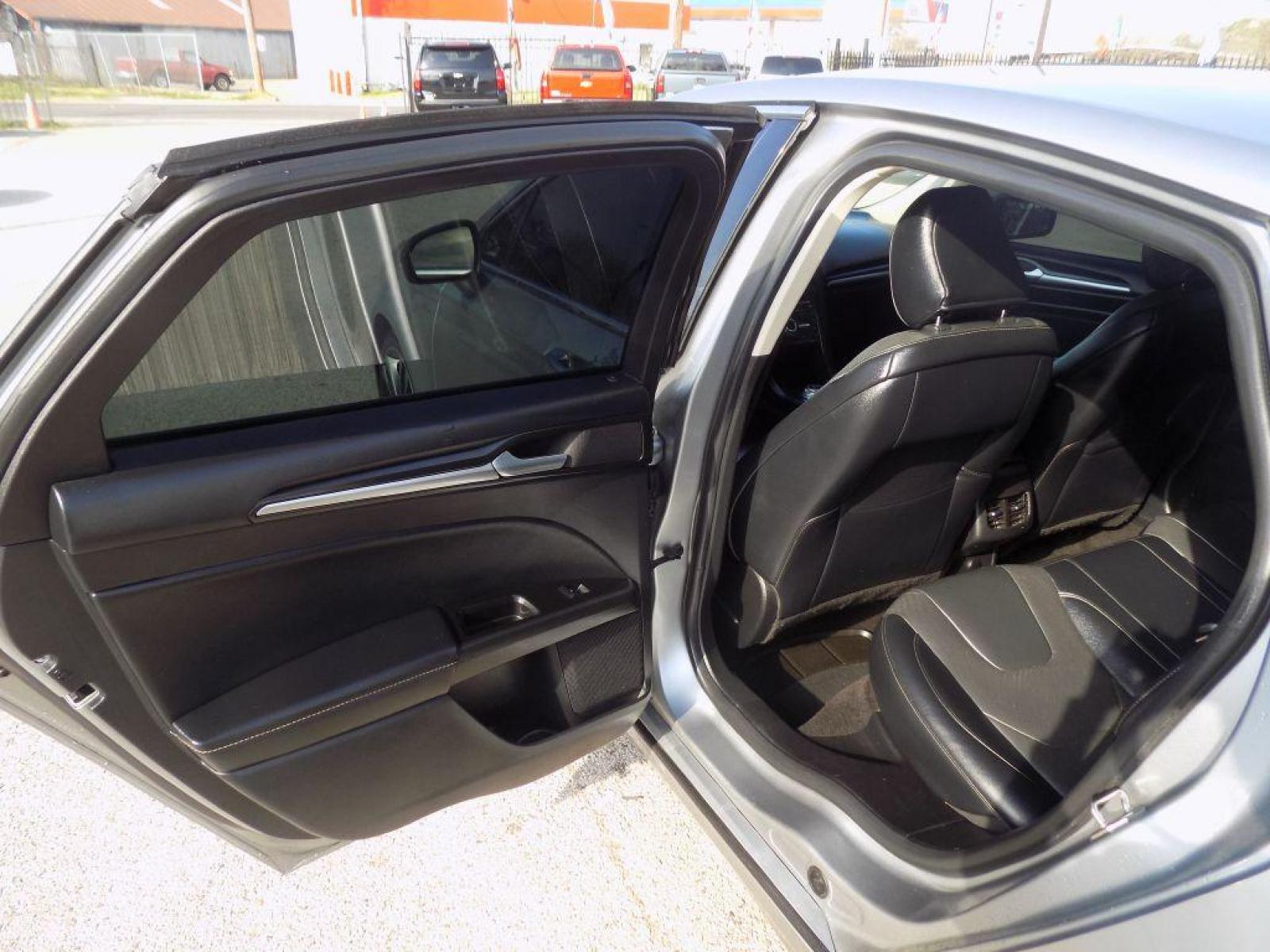 2020 SILVER FORD FUSION** TITANIUM (3FA6P0K9XLR) with an 2.0L engine, Automatic transmission, located at 830 E. Canino Rd., Houston, TX, 77037, (281) 405-0440, 38.358219, -81.729942 - Photo #17