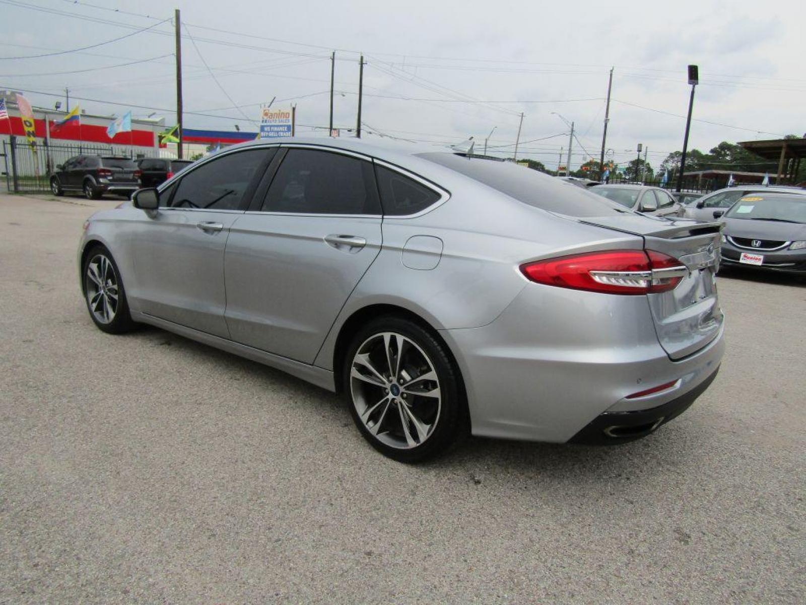 2020 SILVER FORD FUSION** TITANIUM (3FA6P0K9XLR) with an 2.0L engine, Automatic transmission, located at 830 E. Canino Rd., Houston, TX, 77037, (281) 405-0440, 38.358219, -81.729942 - Photo #4