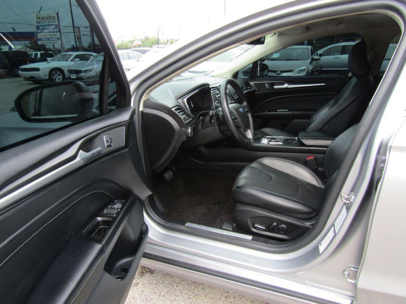2020 SILVER FORD FUSION** TITANIUM (3FA6P0K9XLR) with an 2.0L engine, Automatic transmission, located at 830 E. Canino Rd., Houston, TX, 77037, (281) 405-0440, 38.358219, -81.729942 - Photo #6
