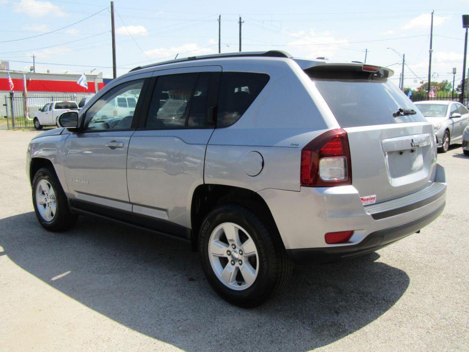 2016 SILVER JEEP COMPASS LATITUDE (1C4NJCEA2GD) with an 2.0L engine, Continuously Variable transmission, located at 830 E. Canino Rd., Houston, TX, 77037, (281) 405-0440, 38.358219, -81.729942 - Photo #1