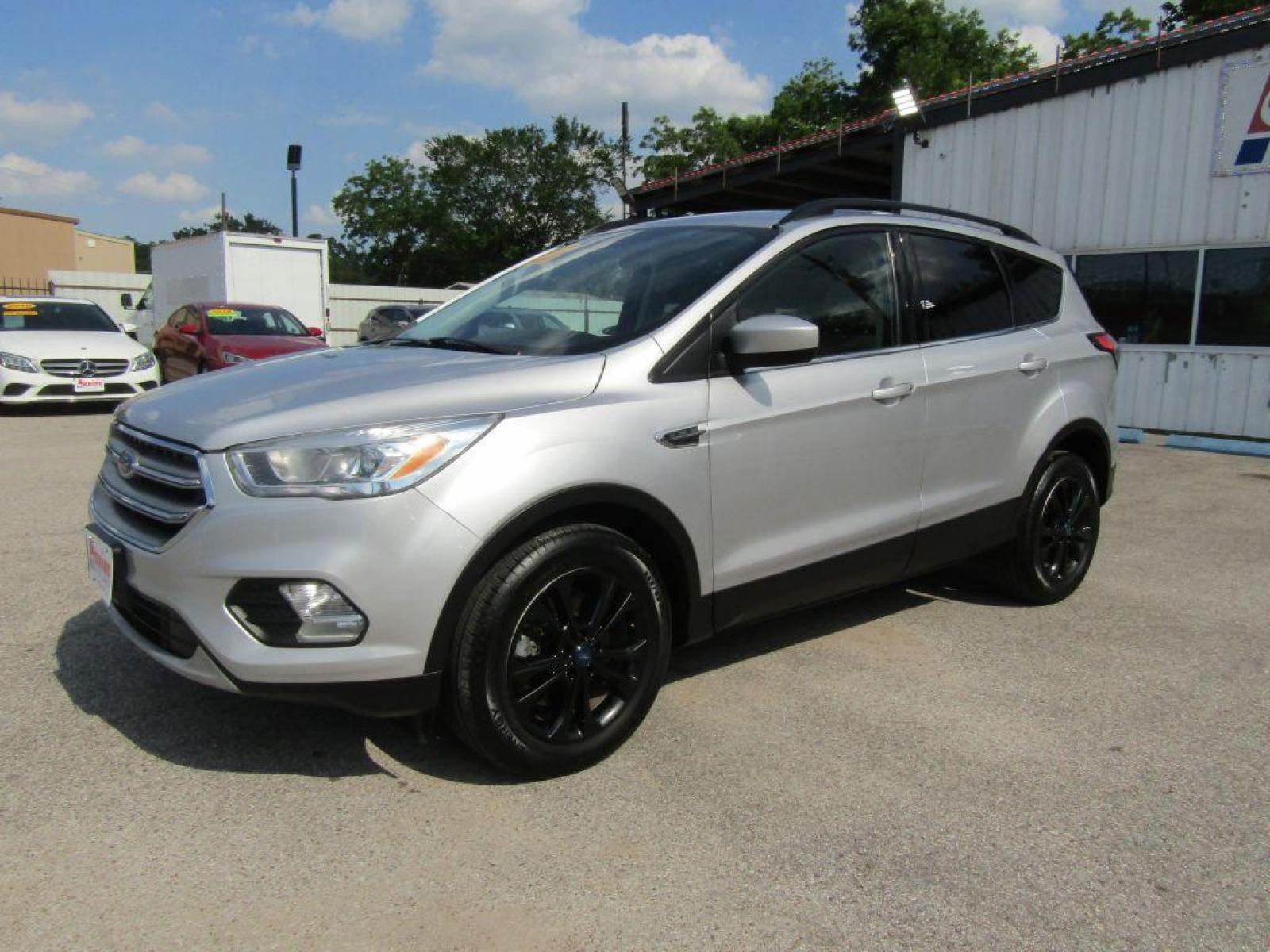 2017 SILVER FORD ESCAPE** SE (1FMCU0G97HU) with an 2.0L engine, Automatic transmission, located at 830 E. Canino Rd., Houston, TX, 77037, (281) 405-0440, 38.358219, -81.729942 - Photo #1