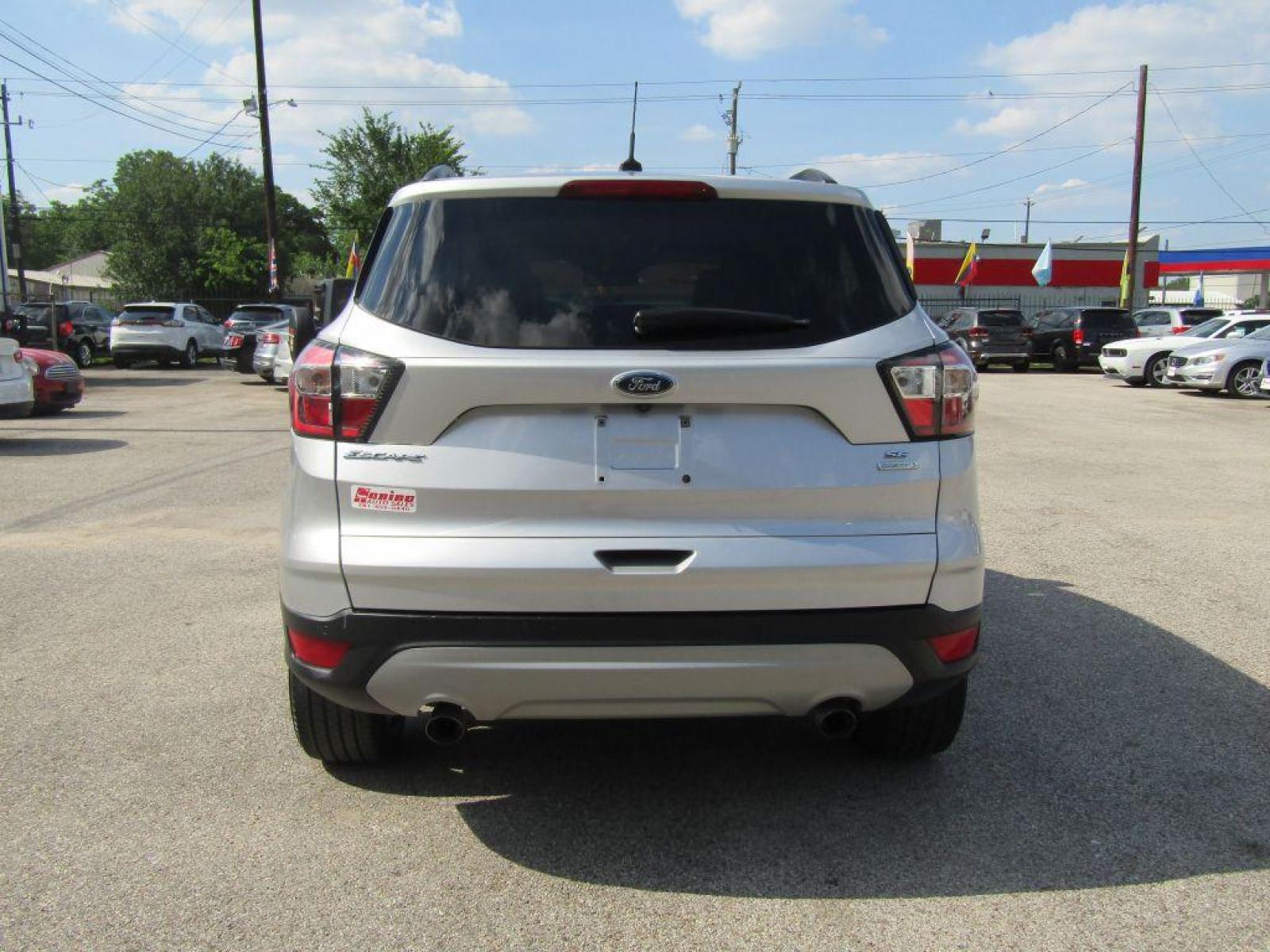 2017 SILVER FORD ESCAPE** SE (1FMCU0G97HU) with an 2.0L engine, Automatic transmission, located at 830 E. Canino Rd., Houston, TX, 77037, (281) 405-0440, 38.358219, -81.729942 - Photo #3