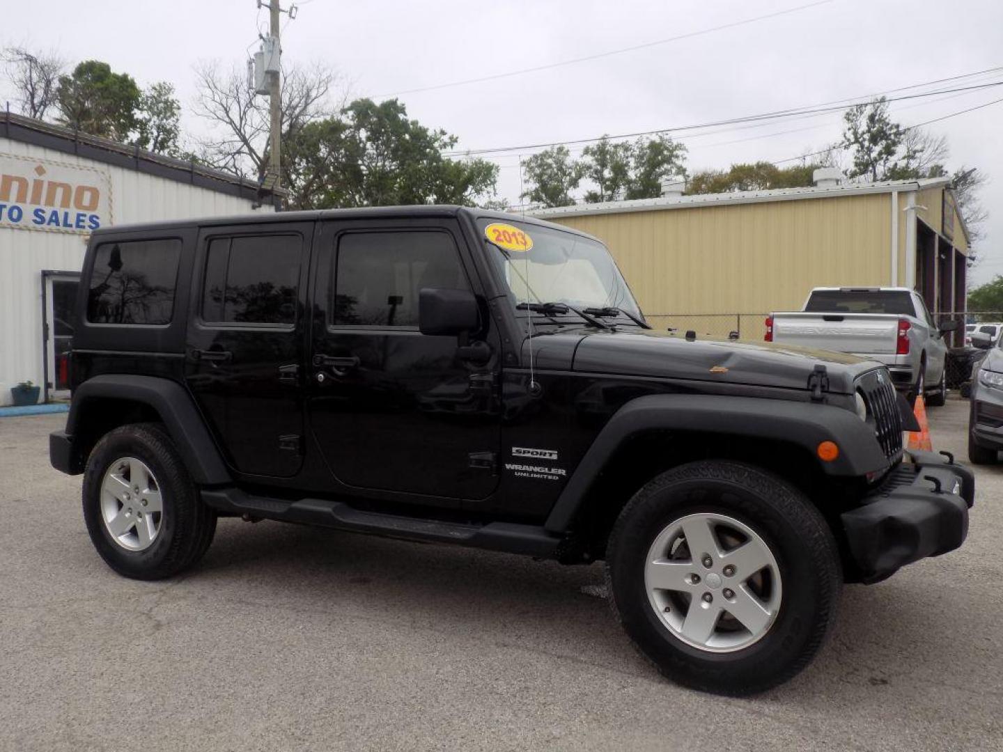 2013 BLACK JEEP WRANGLER UNLIMI SPORT (1C4BJWDG3DL) with an 3.6L engine, Automatic transmission, located at 830 E. Canino Rd., Houston, TX, 77037, (281) 405-0440, 38.358219, -81.729942 - Photo#0