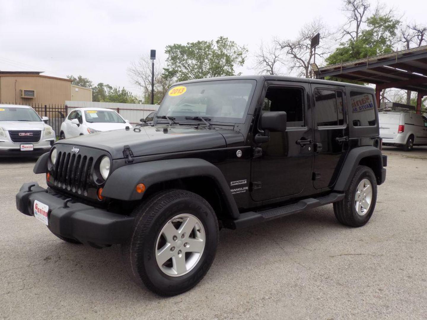 2013 BLACK JEEP WRANGLER UNLIMI SPORT (1C4BJWDG3DL) with an 3.6L engine, Automatic transmission, located at 830 E. Canino Rd., Houston, TX, 77037, (281) 405-0440, 38.358219, -81.729942 - Photo#6