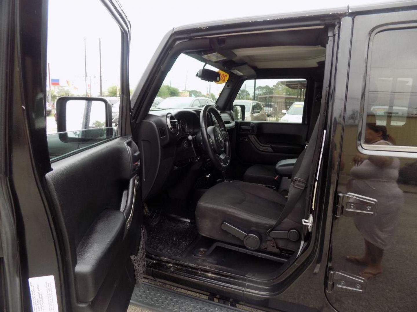 2013 BLACK JEEP WRANGLER UNLIMI SPORT (1C4BJWDG3DL) with an 3.6L engine, Automatic transmission, located at 830 E. Canino Rd., Houston, TX, 77037, (281) 405-0440, 38.358219, -81.729942 - Photo#7