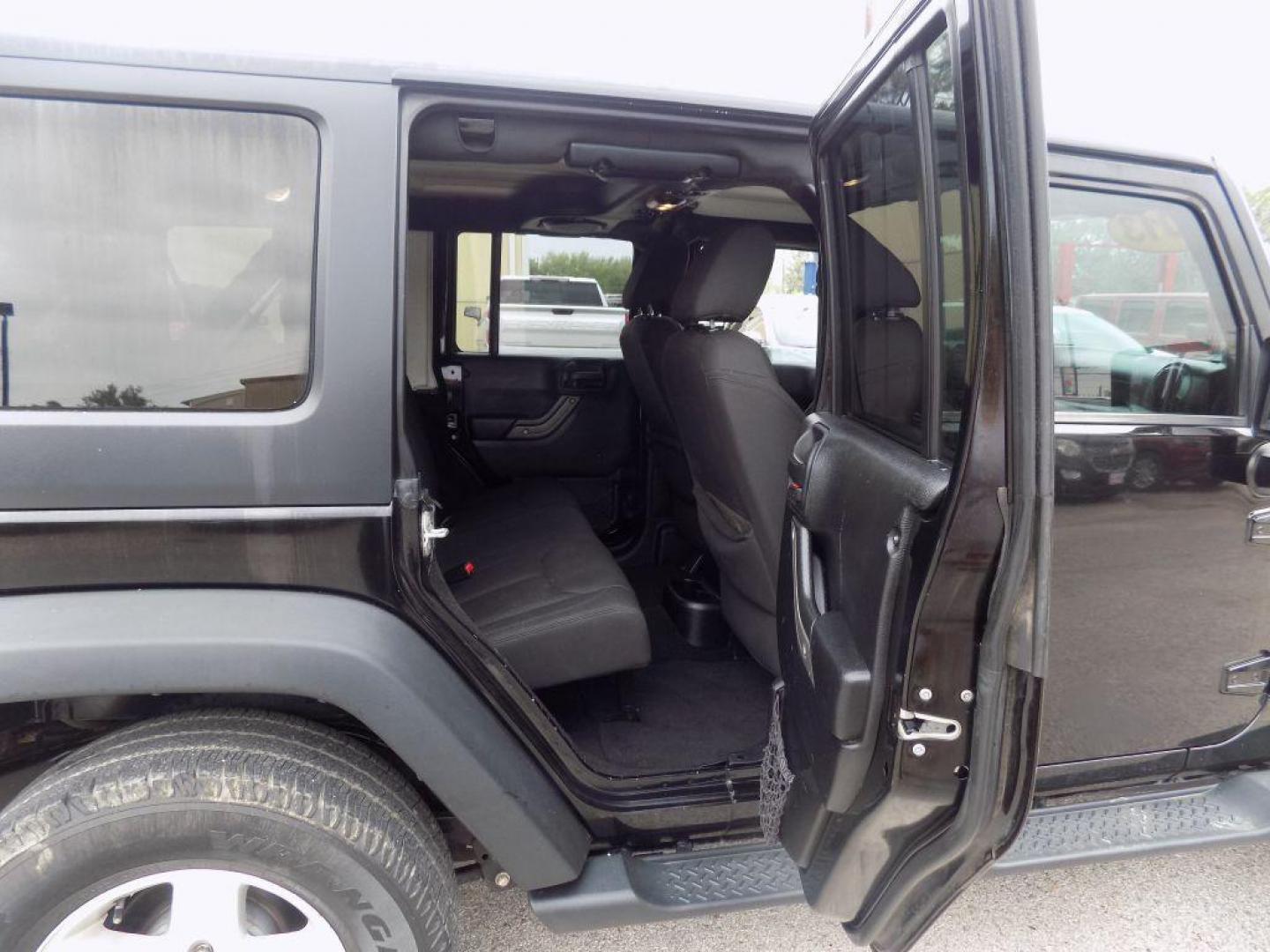 2013 BLACK JEEP WRANGLER UNLIMI SPORT (1C4BJWDG3DL) with an 3.6L engine, Automatic transmission, located at 830 E. Canino Rd., Houston, TX, 77037, (281) 405-0440, 38.358219, -81.729942 - Photo#10