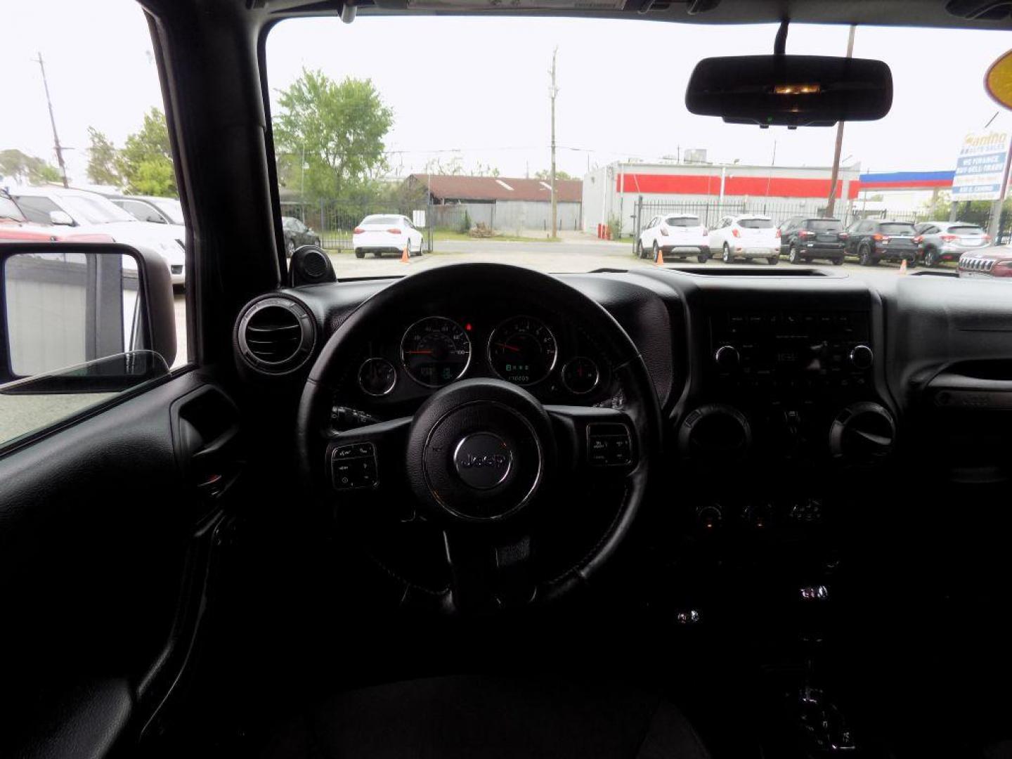 2013 BLACK JEEP WRANGLER UNLIMI SPORT (1C4BJWDG3DL) with an 3.6L engine, Automatic transmission, located at 830 E. Canino Rd., Houston, TX, 77037, (281) 405-0440, 38.358219, -81.729942 - Photo#14