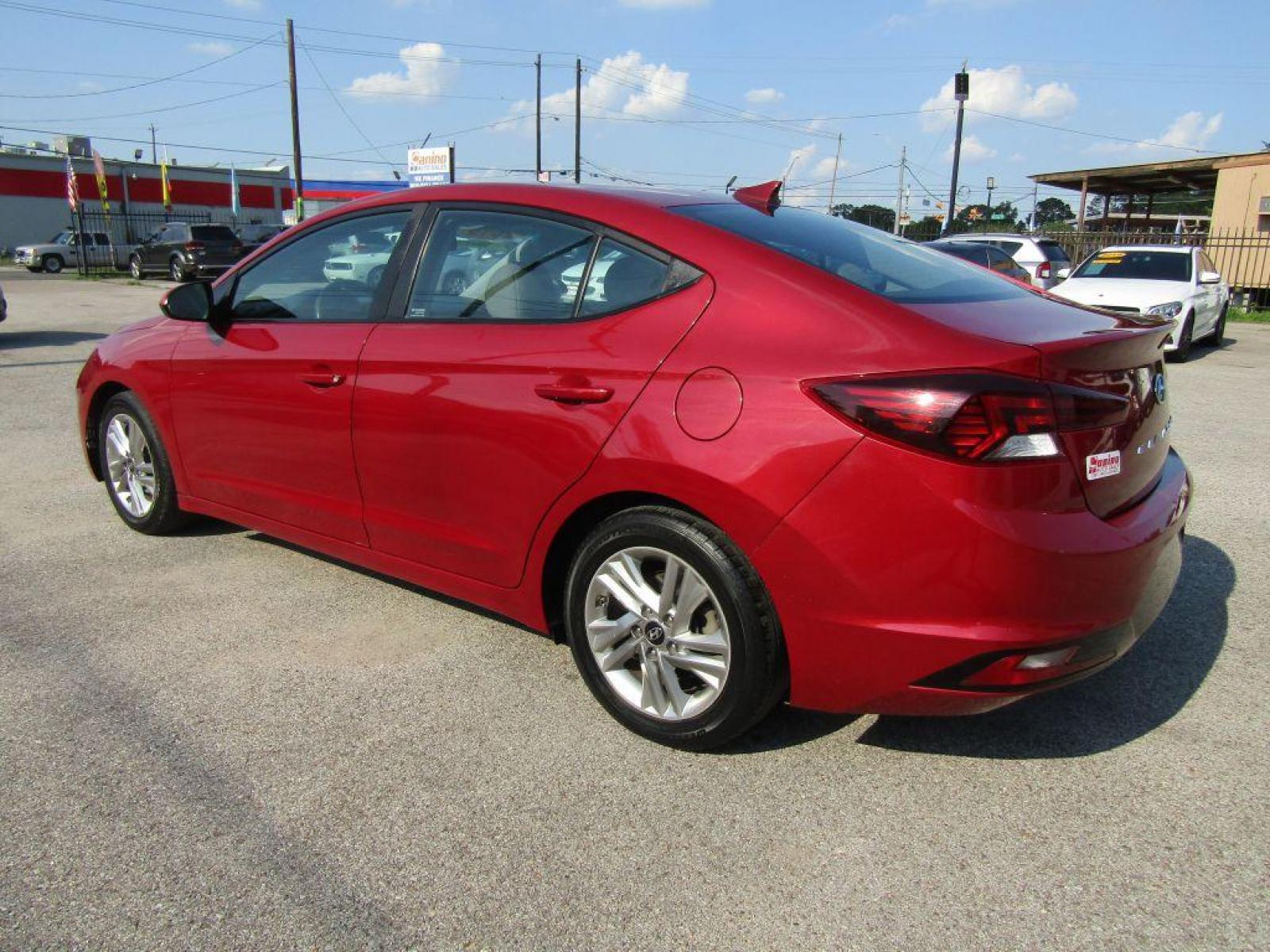 2019 RED HYUNDAI ELANTRA SEL (KMHD84LF0KU) with an 2.0L engine, Automatic transmission, located at 830 E. Canino Rd., Houston, TX, 77037, (281) 405-0440, 38.358219, -81.729942 - Photo #2