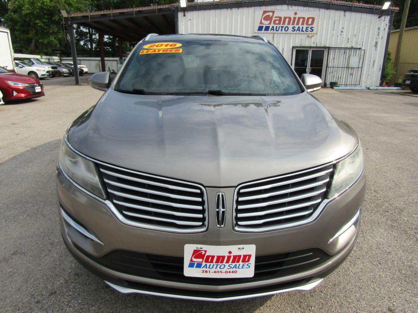 2016 BROWN LINCOLN MKC PREMIERE (5LMCJ1C94GU) with an 2.0L engine, Automatic transmission, located at 830 E. Canino Rd., Houston, TX, 77037, (281) 405-0440, 38.358219, -81.729942 - $1900+TT and L - Photo#0