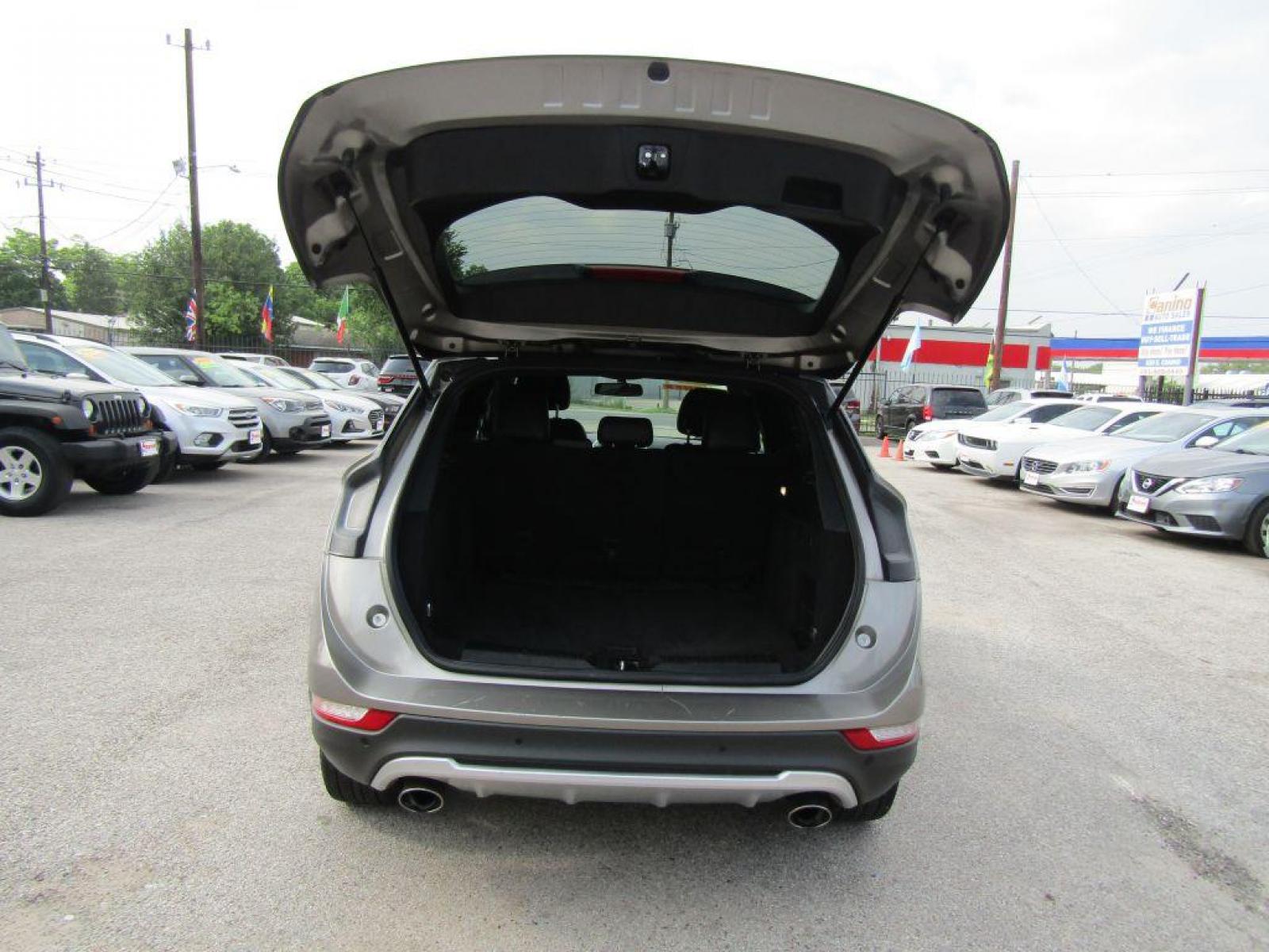 2016 BROWN LINCOLN MKC PREMIERE (5LMCJ1C94GU) with an 2.0L engine, Automatic transmission, located at 830 E. Canino Rd., Houston, TX, 77037, (281) 405-0440, 38.358219, -81.729942 - $1900+TT and L - Photo #10