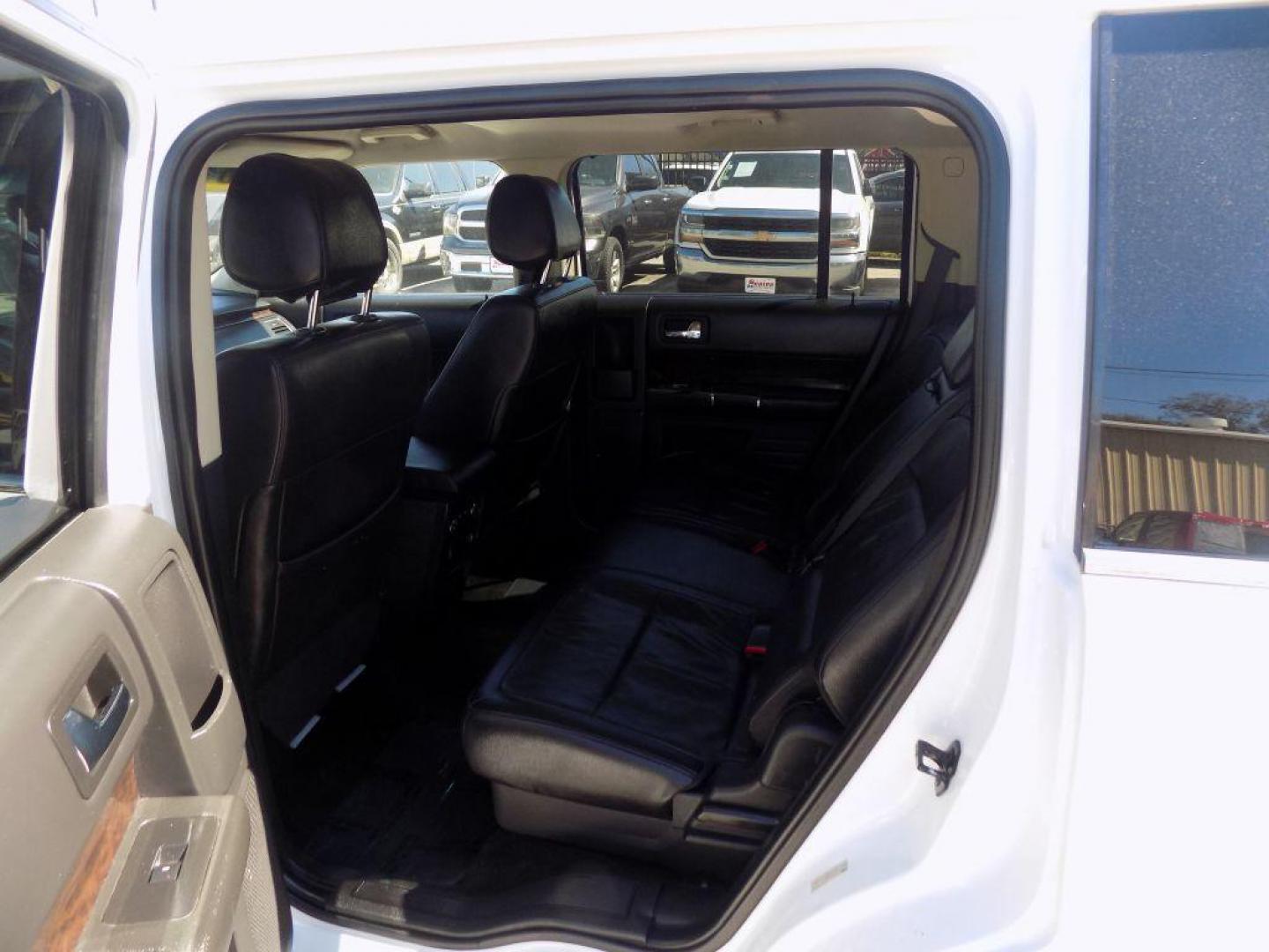 2017 WHITE FORD FLEX LIMITED (2FMGK5D86HB) with an 3.5L engine, Automatic transmission, located at 830 E. Canino Rd., Houston, TX, 77037, (281) 405-0440, 38.358219, -81.729942 - Photo#16