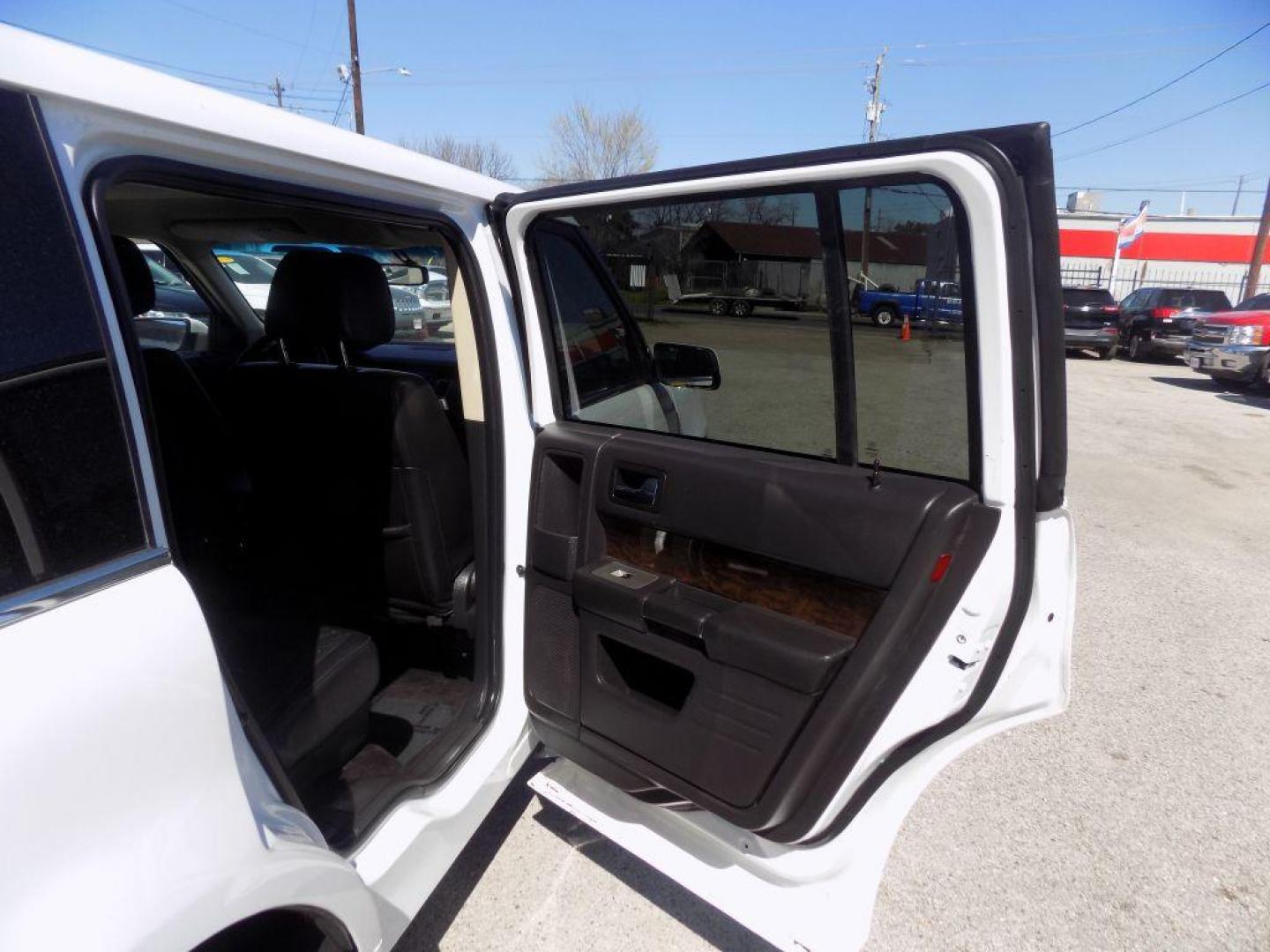 2017 WHITE FORD FLEX LIMITED (2FMGK5D86HB) with an 3.5L engine, Automatic transmission, located at 830 E. Canino Rd., Houston, TX, 77037, (281) 405-0440, 38.358219, -81.729942 - Photo#20