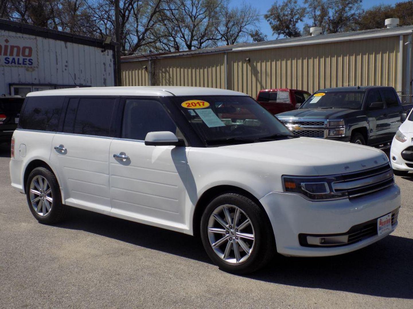 2017 WHITE FORD FLEX LIMITED (2FMGK5D86HB) with an 3.5L engine, Automatic transmission, located at 830 E. Canino Rd., Houston, TX, 77037, (281) 405-0440, 38.358219, -81.729942 - Photo#2