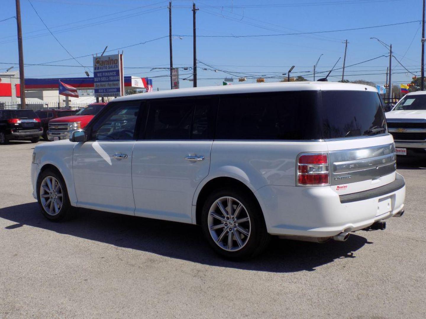 2017 WHITE FORD FLEX LIMITED (2FMGK5D86HB) with an 3.5L engine, Automatic transmission, located at 830 E. Canino Rd., Houston, TX, 77037, (281) 405-0440, 38.358219, -81.729942 - Photo#4