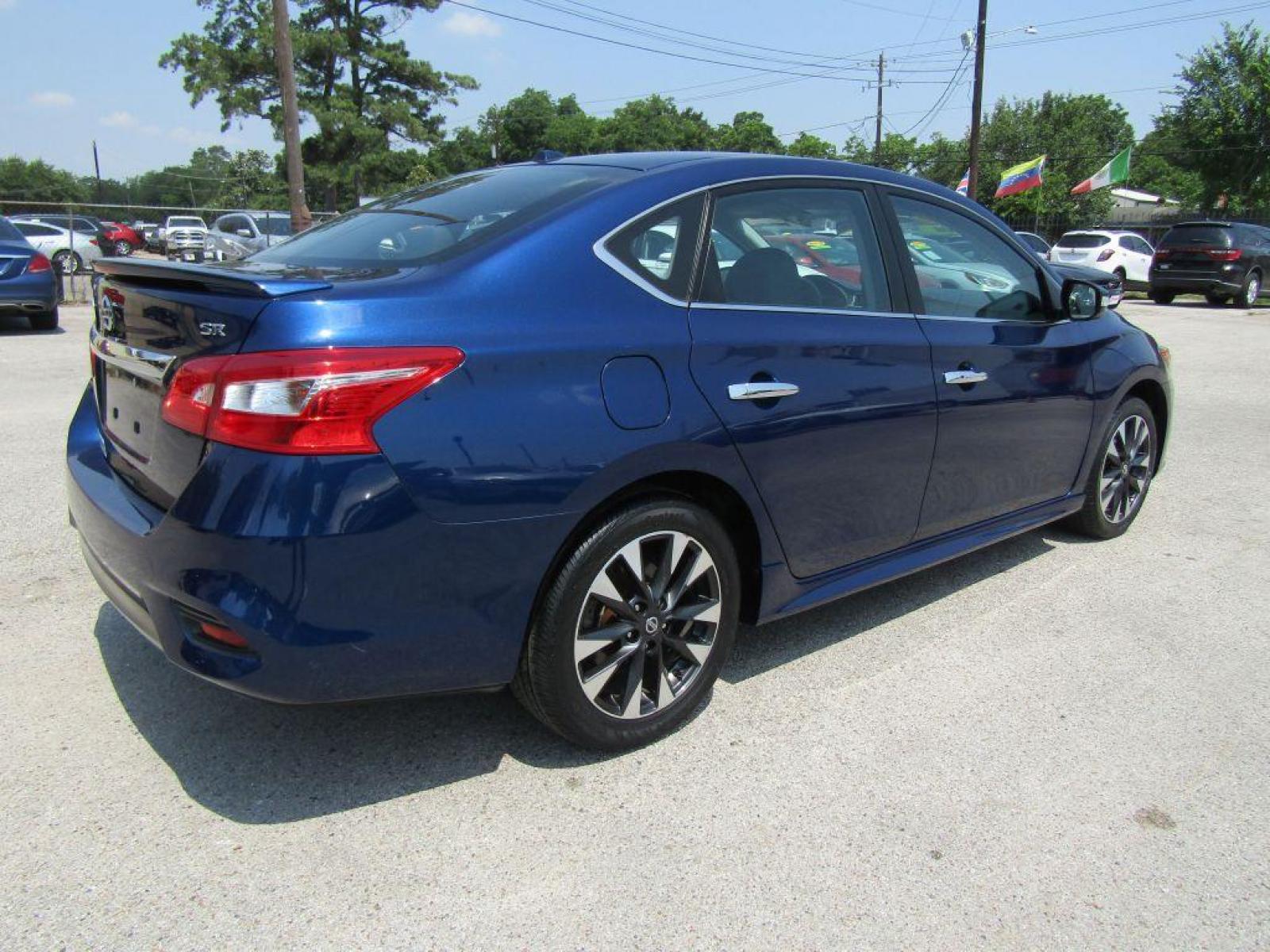 2019 BLUE NISSAN SENTRA S (3N1AB7AP1KY) with an 1.8L engine, Continuously Variable transmission, located at 830 E. Canino Rd., Houston, TX, 77037, (281) 405-0440, 38.358219, -81.729942 - Photo #2