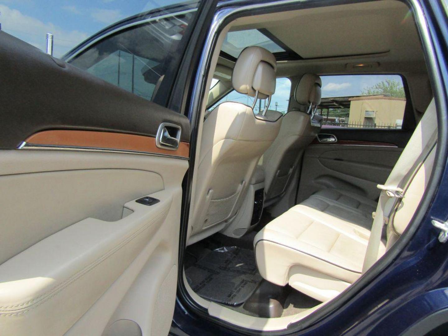 2013 BLUE JEEP GRAND CHEROKEE OVERLAND (1C4RJECG5DC) with an 3.6L engine, Automatic transmission, located at 830 E. Canino Rd., Houston, TX, 77037, (281) 405-0440, 38.358219, -81.729942 - Photo#9