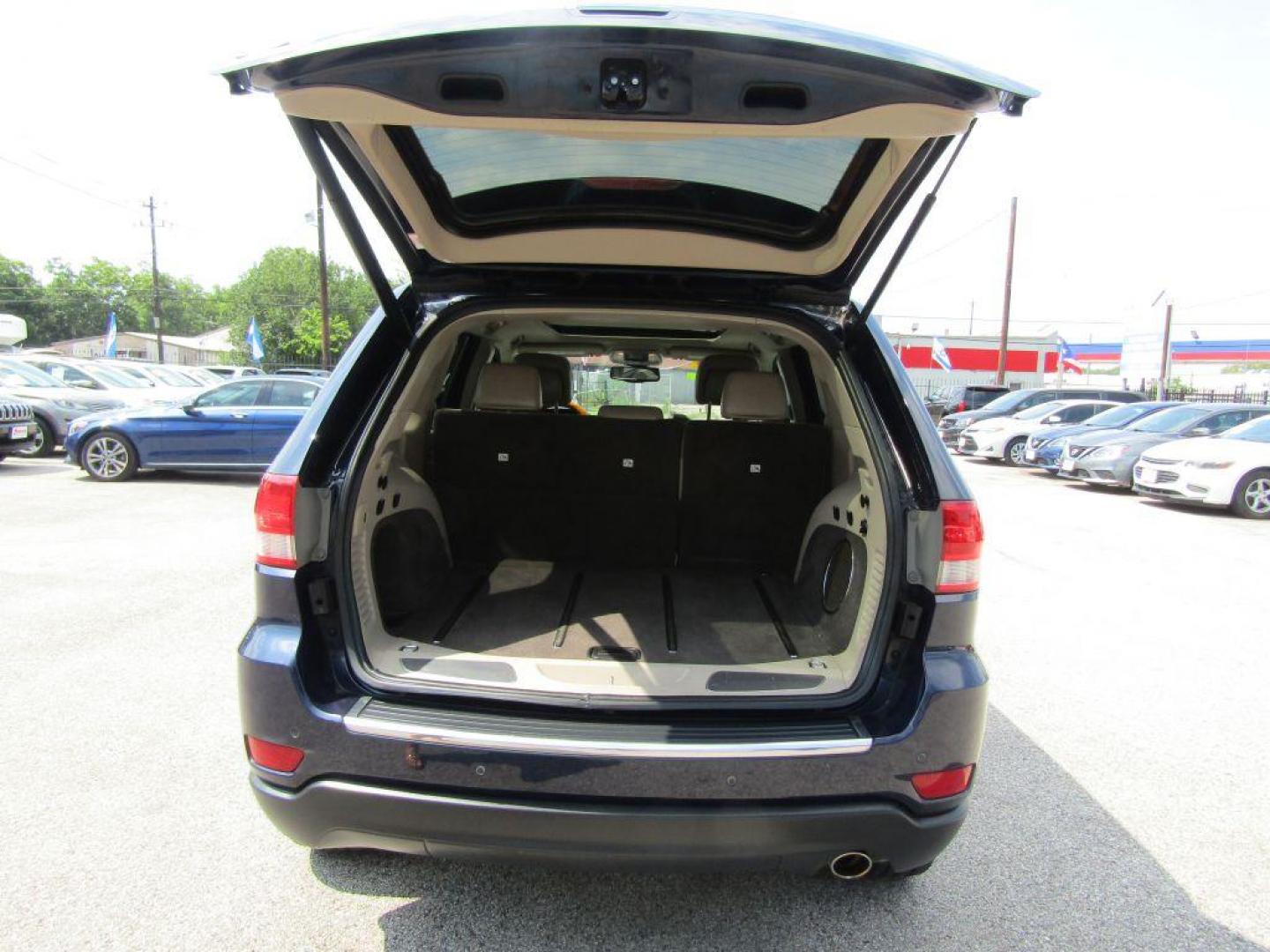 2013 BLUE JEEP GRAND CHEROKEE OVERLAND (1C4RJECG5DC) with an 3.6L engine, Automatic transmission, located at 830 E. Canino Rd., Houston, TX, 77037, (281) 405-0440, 38.358219, -81.729942 - Photo#12