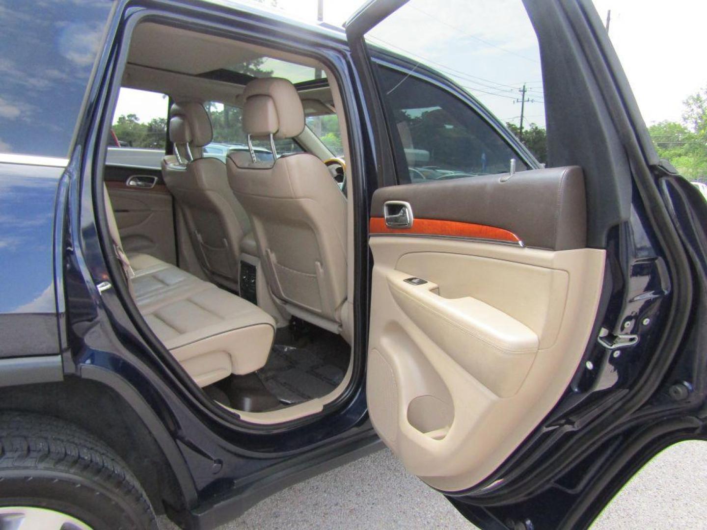 2013 BLUE JEEP GRAND CHEROKEE OVERLAND (1C4RJECG5DC) with an 3.6L engine, Automatic transmission, located at 830 E. Canino Rd., Houston, TX, 77037, (281) 405-0440, 38.358219, -81.729942 - Photo#15