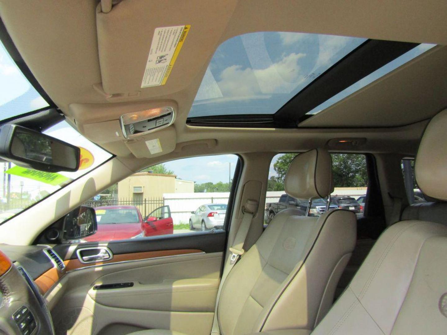 2013 BLUE JEEP GRAND CHEROKEE OVERLAND (1C4RJECG5DC) with an 3.6L engine, Automatic transmission, located at 830 E. Canino Rd., Houston, TX, 77037, (281) 405-0440, 38.358219, -81.729942 - Photo#7