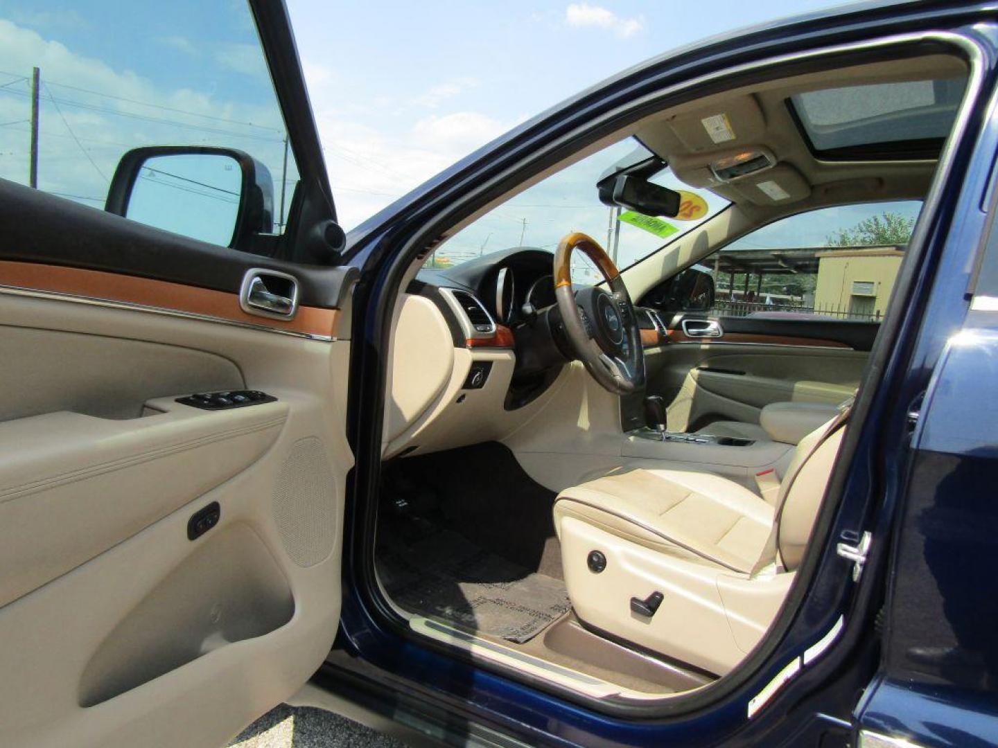 2013 BLUE JEEP GRAND CHEROKEE OVERLAND (1C4RJECG5DC) with an 3.6L engine, Automatic transmission, located at 830 E. Canino Rd., Houston, TX, 77037, (281) 405-0440, 38.358219, -81.729942 - Photo#8