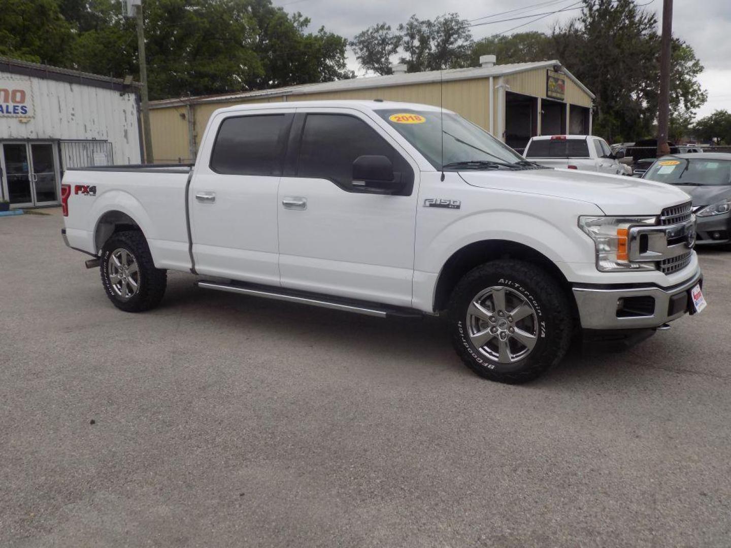 2018 WHITE FORD F150 SUPERCREW (1FTFW1E58JK) with an 5.0L engine, Automatic transmission, located at 830 E. Canino Rd., Houston, TX, 77037, (281) 405-0440, 38.358219, -81.729942 - VENGA A VISITARNOS A CANINO AUTO SALES. ENTRE CAMINANDO Y SALGA MANEJANDO. APROVACION GARANTIZADA CON REQUISITOS MINIMOS! PREGUNTEN POR JESSICA, MAY, O CARRIE PARA SU APROBACION SEGURA. ??830 E CANINO RD HOUSTON TX 77037 ??(281) 405-0440 come visit us today!! walk in/ drive out in minutes! - Photo#2