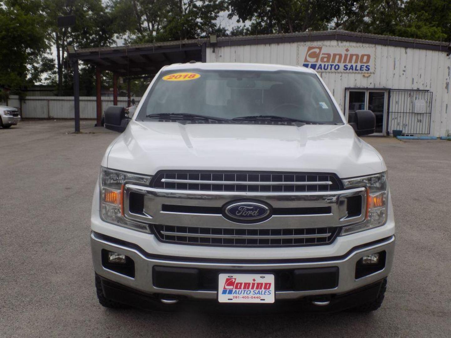2018 WHITE FORD F150 SUPERCREW (1FTFW1E58JK) with an 5.0L engine, Automatic transmission, located at 830 E. Canino Rd., Houston, TX, 77037, (281) 405-0440, 38.358219, -81.729942 - VENGA A VISITARNOS A CANINO AUTO SALES. ENTRE CAMINANDO Y SALGA MANEJANDO. APROVACION GARANTIZADA CON REQUISITOS MINIMOS! PREGUNTEN POR JESSICA, MAY, O CARRIE PARA SU APROBACION SEGURA. ??830 E CANINO RD HOUSTON TX 77037 ??(281) 405-0440 come visit us today!! walk in/ drive out in minutes! - Photo#0
