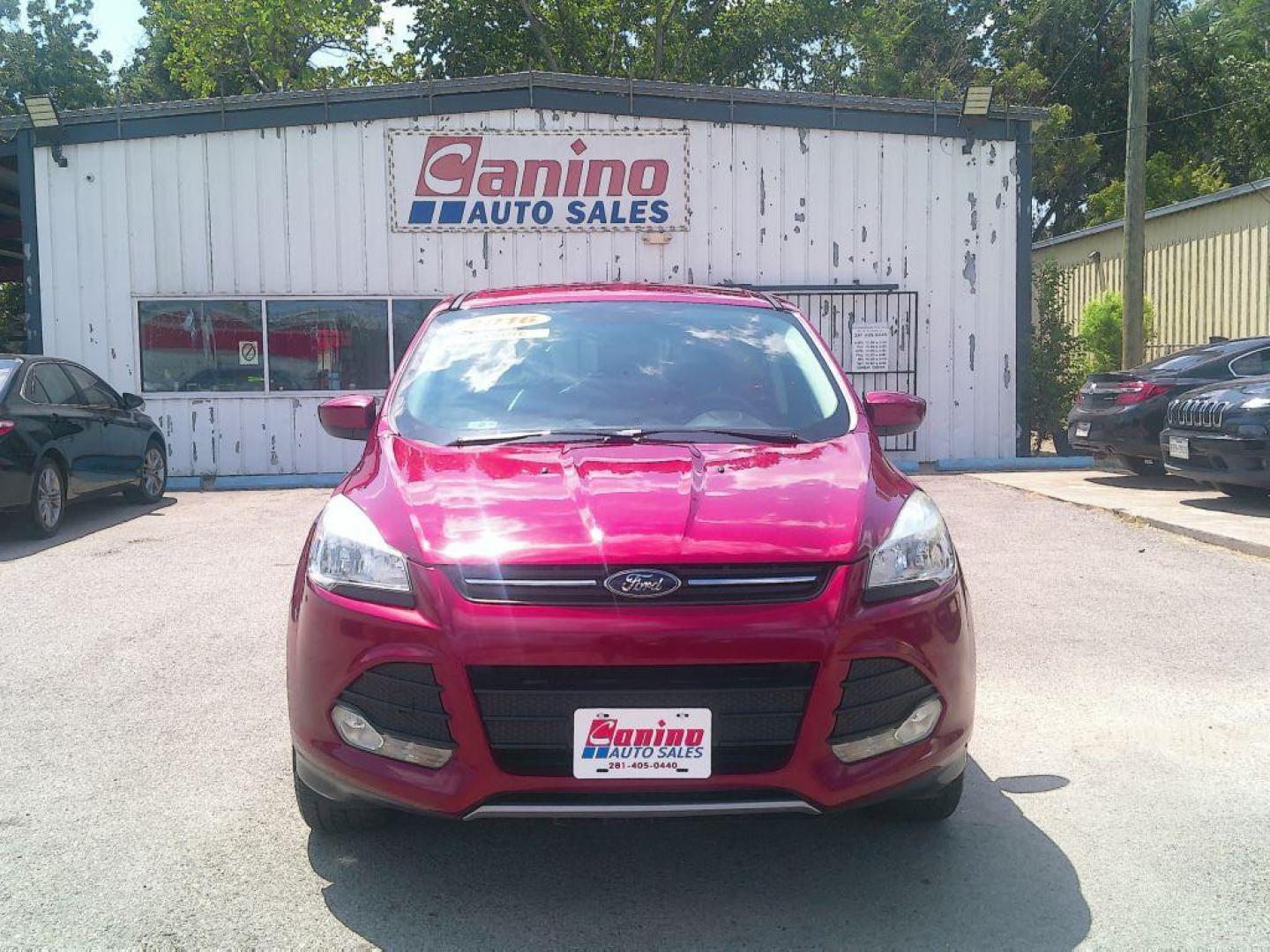 2016 RED FORD ESCAPE SE (1FMCU0GXXGU) with an 1.6L engine, Automatic transmission, located at 830 E. Canino Rd., Houston, TX, 77037, (281) 405-0440, 38.358219, -81.729942 - Photo#0