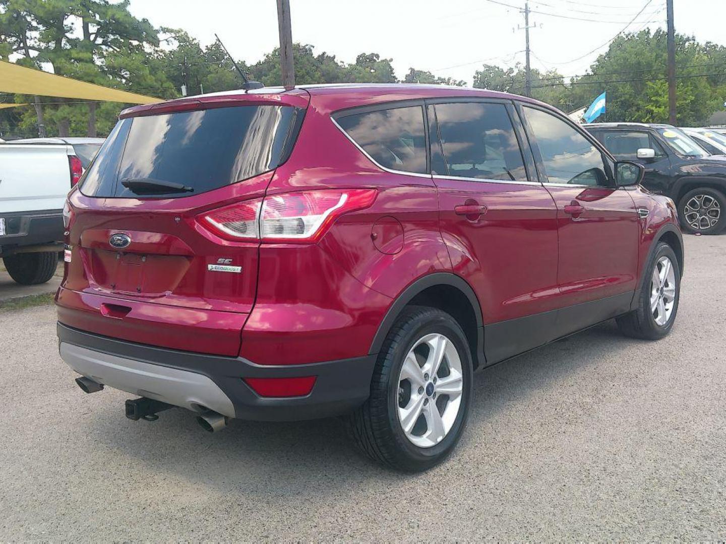 2016 RED FORD ESCAPE SE (1FMCU0GXXGU) with an 1.6L engine, Automatic transmission, located at 830 E. Canino Rd., Houston, TX, 77037, (281) 405-0440, 38.358219, -81.729942 - Photo#7