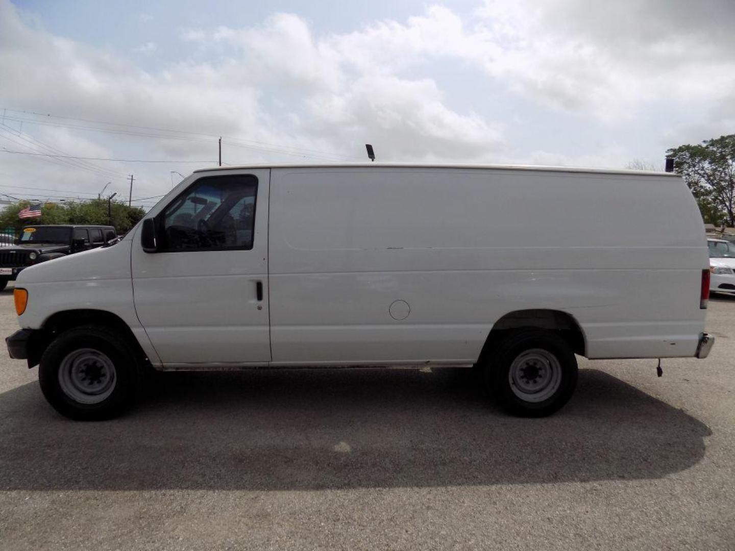 2005 WHITE FORD ECONOLINE E250 VAN (1FTNS24L35H) with an 5.4L engine, Automatic transmission, located at 830 E. Canino Rd., Houston, TX, 77037, (281) 405-0440, 38.358219, -81.729942 - Photo#3