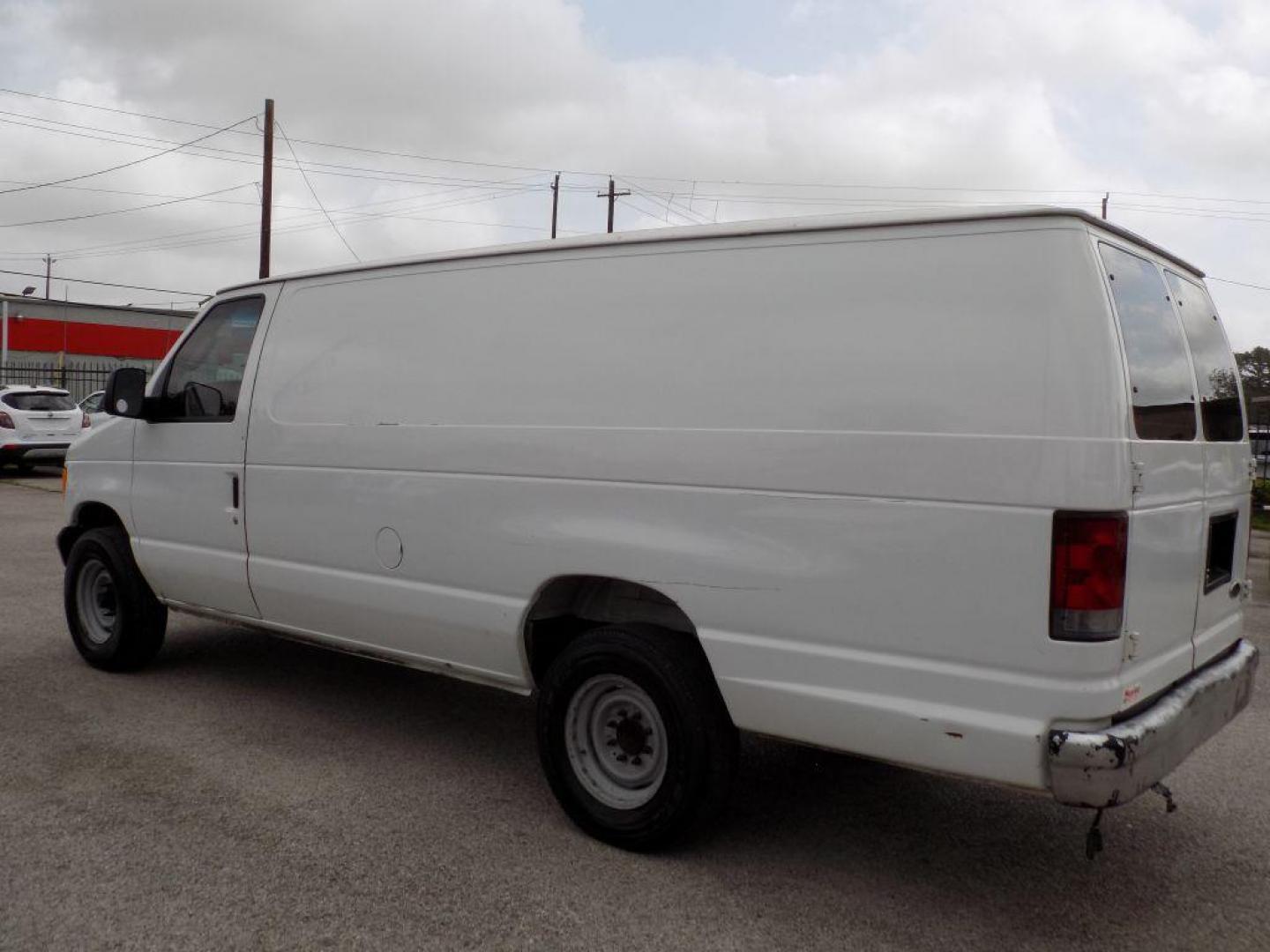 2005 WHITE FORD ECONOLINE E250 VAN (1FTNS24L35H) with an 5.4L engine, Automatic transmission, located at 830 E. Canino Rd., Houston, TX, 77037, (281) 405-0440, 38.358219, -81.729942 - Photo#4
