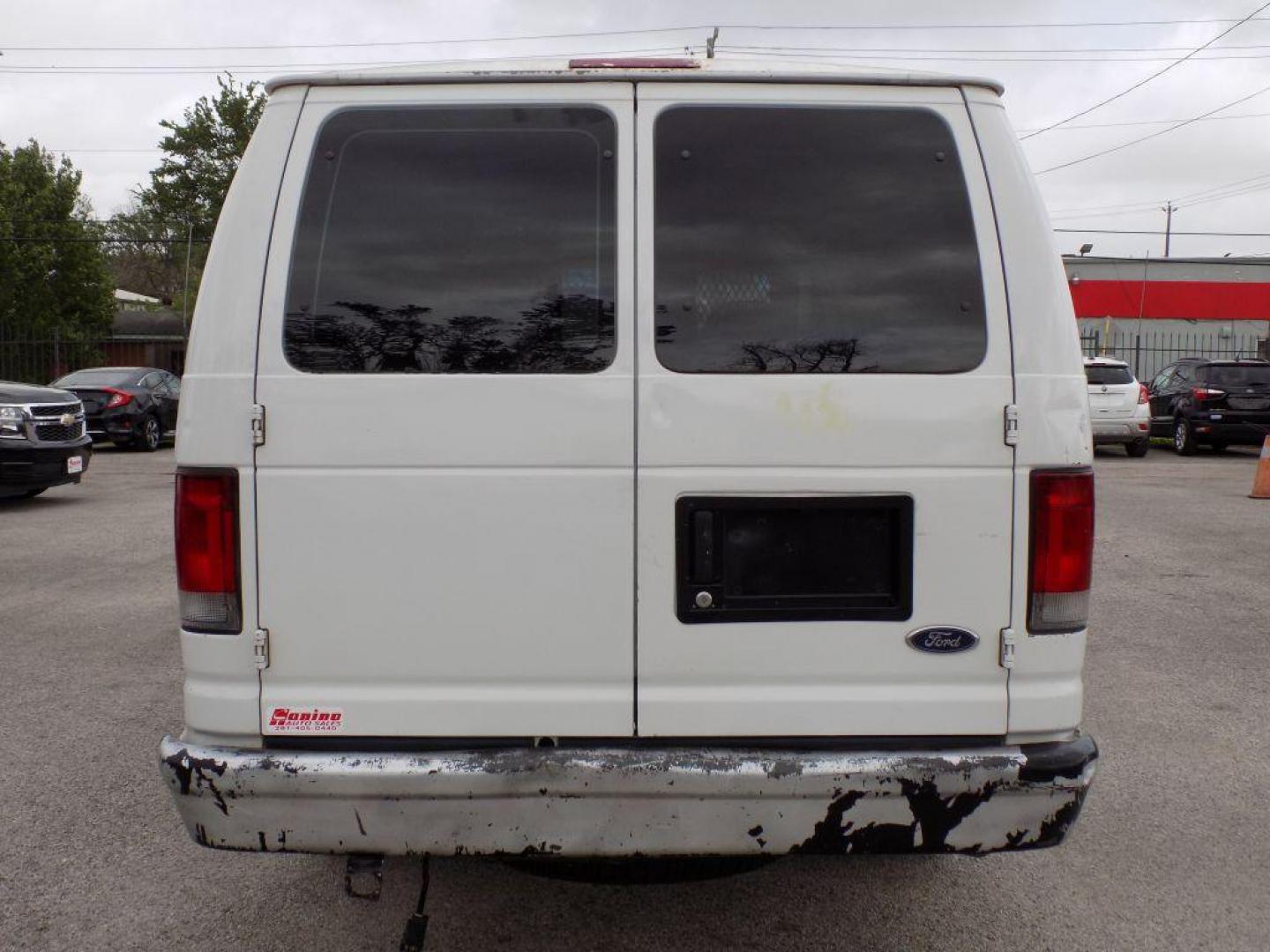 2005 WHITE FORD ECONOLINE E250 VAN (1FTNS24L35H) with an 5.4L engine, Automatic transmission, located at 830 E. Canino Rd., Houston, TX, 77037, (281) 405-0440, 38.358219, -81.729942 - Photo#5