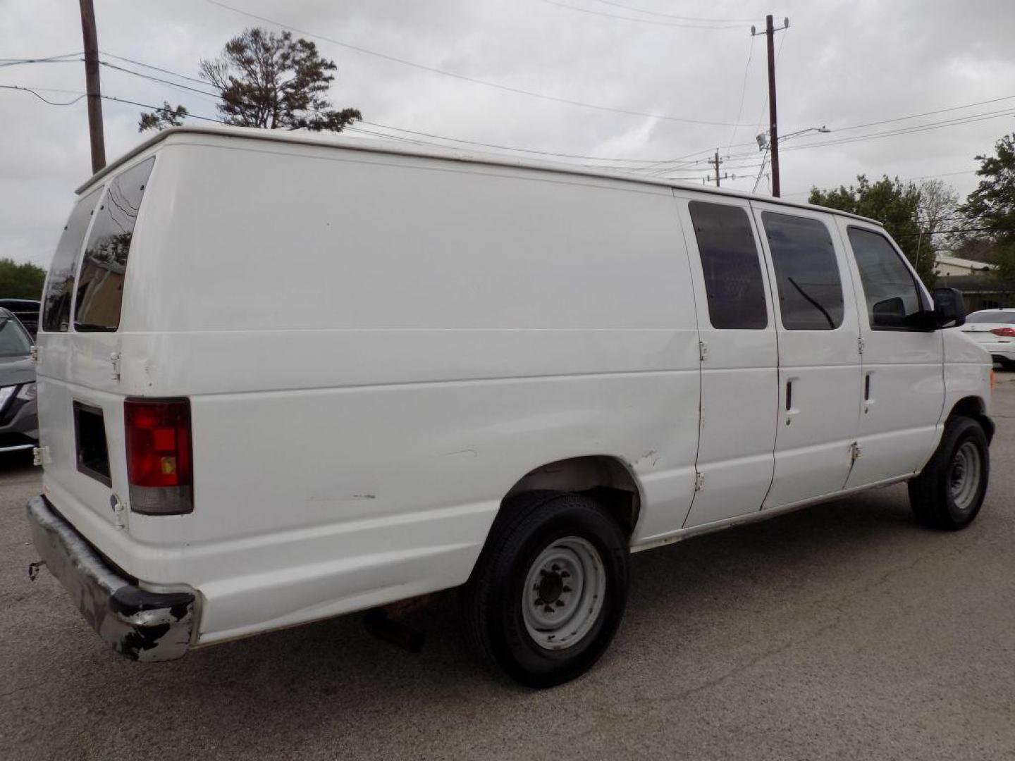 2005 WHITE FORD ECONOLINE E250 VAN (1FTNS24L35H) with an 5.4L engine, Automatic transmission, located at 830 E. Canino Rd., Houston, TX, 77037, (281) 405-0440, 38.358219, -81.729942 - Photo#6