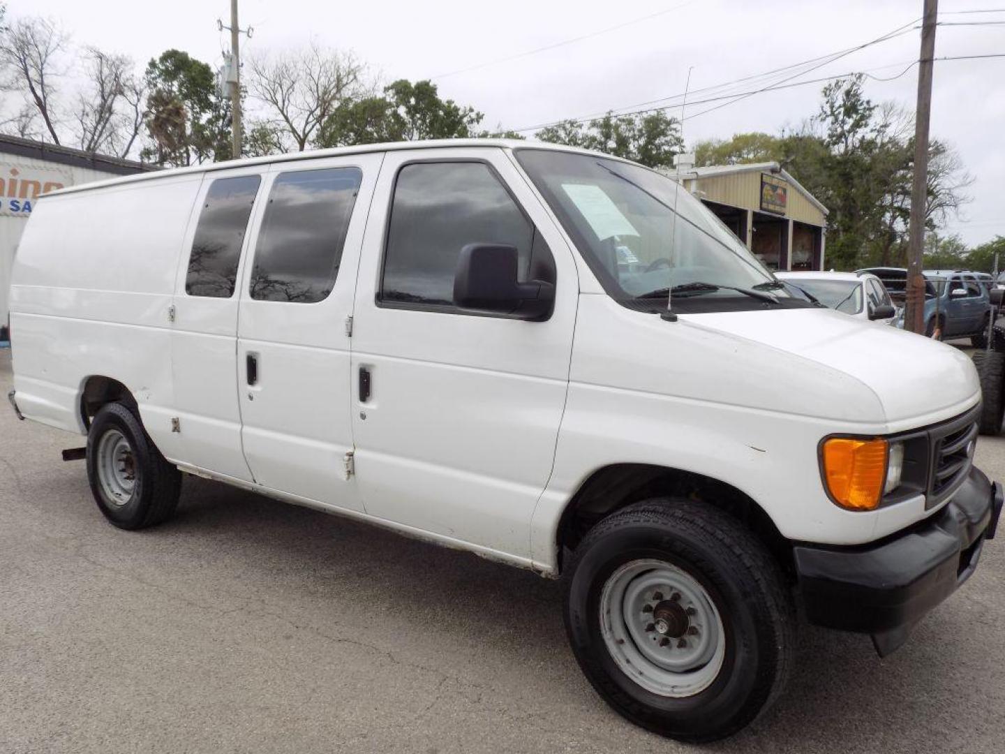 2005 WHITE FORD ECONOLINE E250 VAN (1FTNS24L35H) with an 5.4L engine, Automatic transmission, located at 830 E. Canino Rd., Houston, TX, 77037, (281) 405-0440, 38.358219, -81.729942 - Photo#8