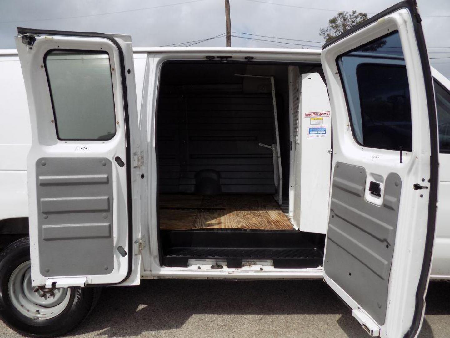 2005 WHITE FORD ECONOLINE E250 VAN (1FTNS24L35H) with an 5.4L engine, Automatic transmission, located at 830 E. Canino Rd., Houston, TX, 77037, (281) 405-0440, 38.358219, -81.729942 - Photo#13