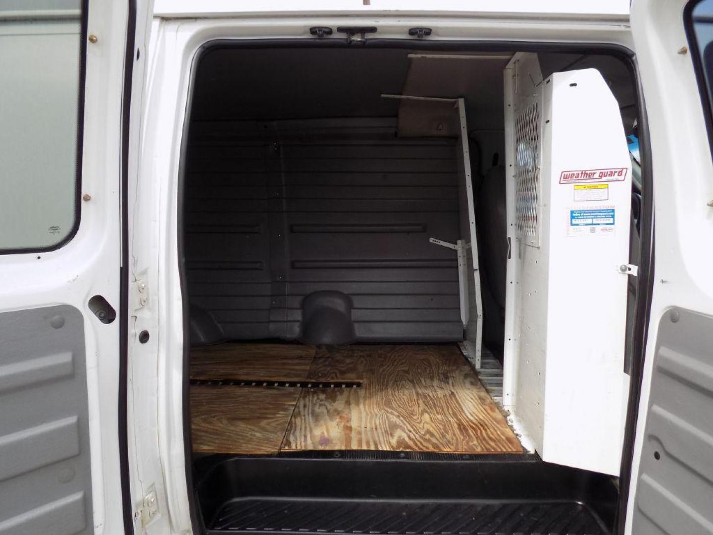 2005 WHITE FORD ECONOLINE E250 VAN (1FTNS24L35H) with an 5.4L engine, Automatic transmission, located at 830 E. Canino Rd., Houston, TX, 77037, (281) 405-0440, 38.358219, -81.729942 - Photo#14