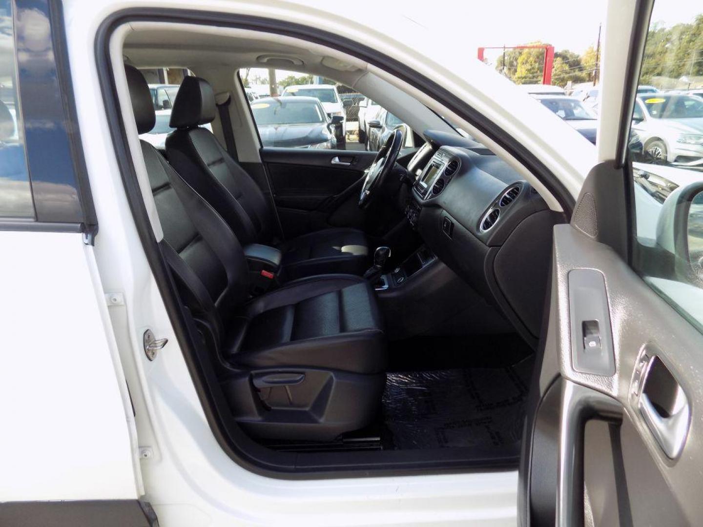 2016 WHITE VOLKSWAGEN TIGUAN S (WVGAV7AX4GW) with an 2.0L engine, Automatic transmission, located at 830 E. Canino Rd., Houston, TX, 77037, (281) 405-0440, 38.358219, -81.729942 - Photo#14