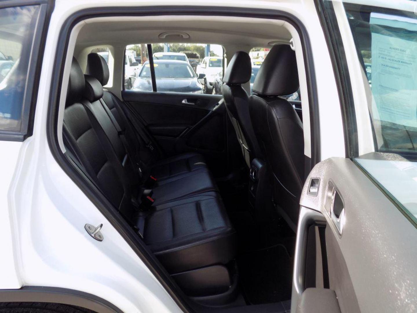 2016 WHITE VOLKSWAGEN TIGUAN S (WVGAV7AX4GW) with an 2.0L engine, Automatic transmission, located at 830 E. Canino Rd., Houston, TX, 77037, (281) 405-0440, 38.358219, -81.729942 - Photo#16