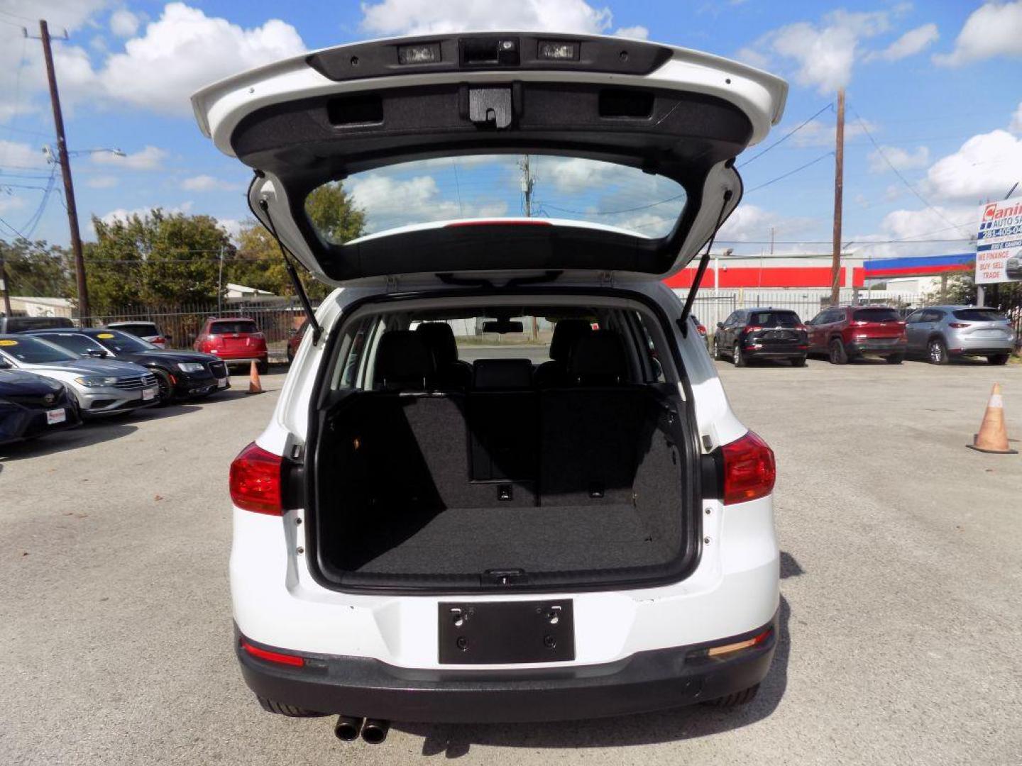 2016 WHITE VOLKSWAGEN TIGUAN S (WVGAV7AX4GW) with an 2.0L engine, Automatic transmission, located at 830 E. Canino Rd., Houston, TX, 77037, (281) 405-0440, 38.358219, -81.729942 - Photo#17