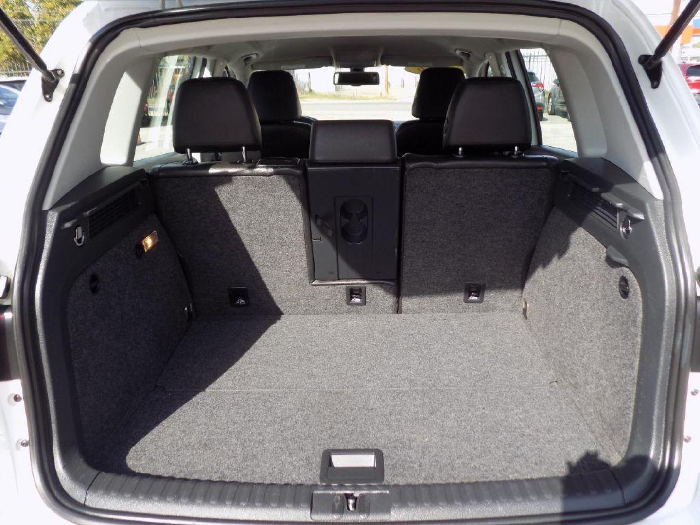 2016 WHITE VOLKSWAGEN TIGUAN S (WVGAV7AX4GW) with an 2.0L engine, Automatic transmission, located at 830 E. Canino Rd., Houston, TX, 77037, (281) 405-0440, 38.358219, -81.729942 - Photo#18