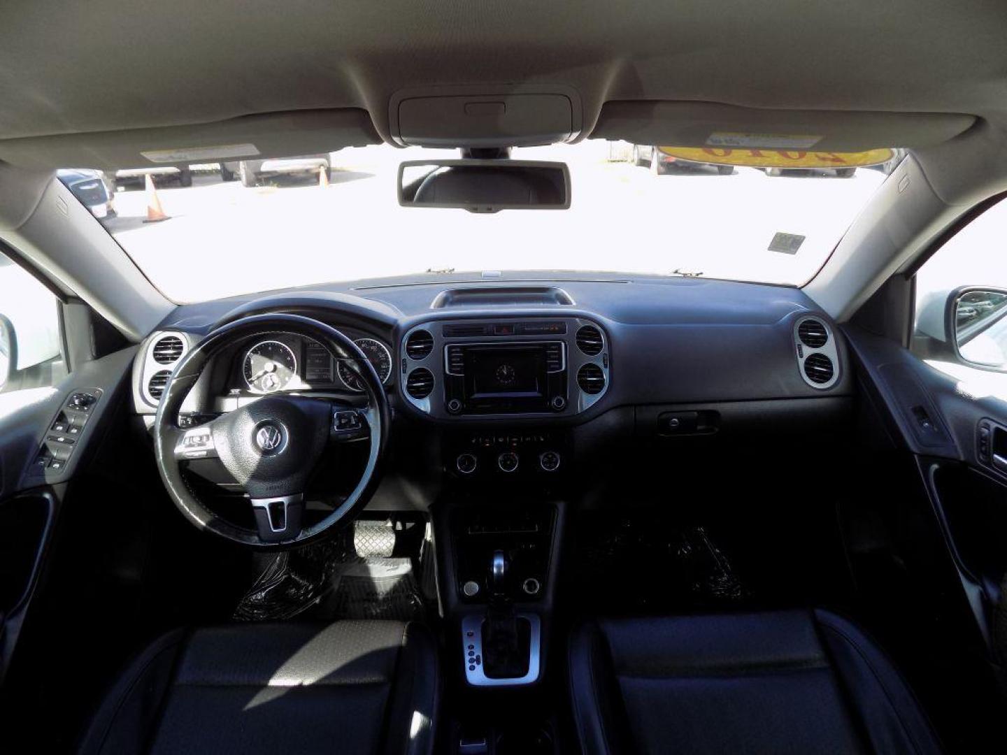 2016 WHITE VOLKSWAGEN TIGUAN S (WVGAV7AX4GW) with an 2.0L engine, Automatic transmission, located at 830 E. Canino Rd., Houston, TX, 77037, (281) 405-0440, 38.358219, -81.729942 - Photo#20