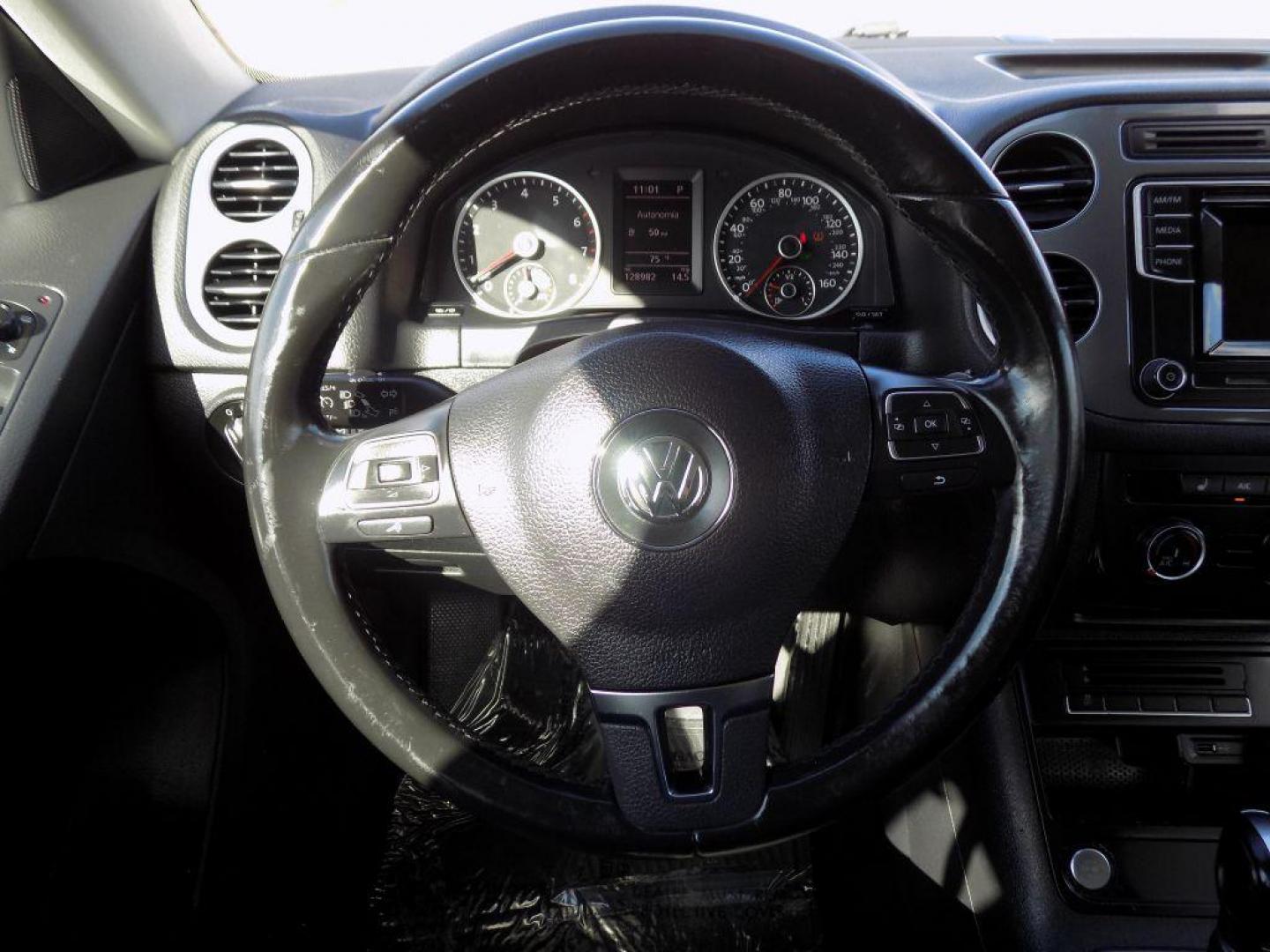 2016 WHITE VOLKSWAGEN TIGUAN S (WVGAV7AX4GW) with an 2.0L engine, Automatic transmission, located at 830 E. Canino Rd., Houston, TX, 77037, (281) 405-0440, 38.358219, -81.729942 - Photo#22