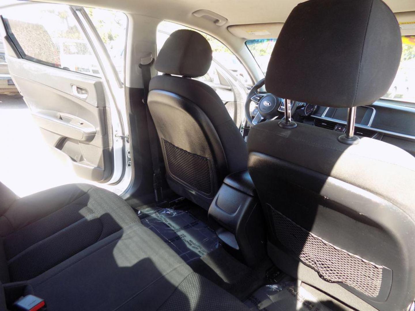 2019 WHITE KIA OPTIMA LX (5XXGT4L3XKG) with an 2.4L engine, Automatic transmission, located at 830 E. Canino Rd., Houston, TX, 77037, (281) 405-0440, 38.358219, -81.729942 - Photo#10
