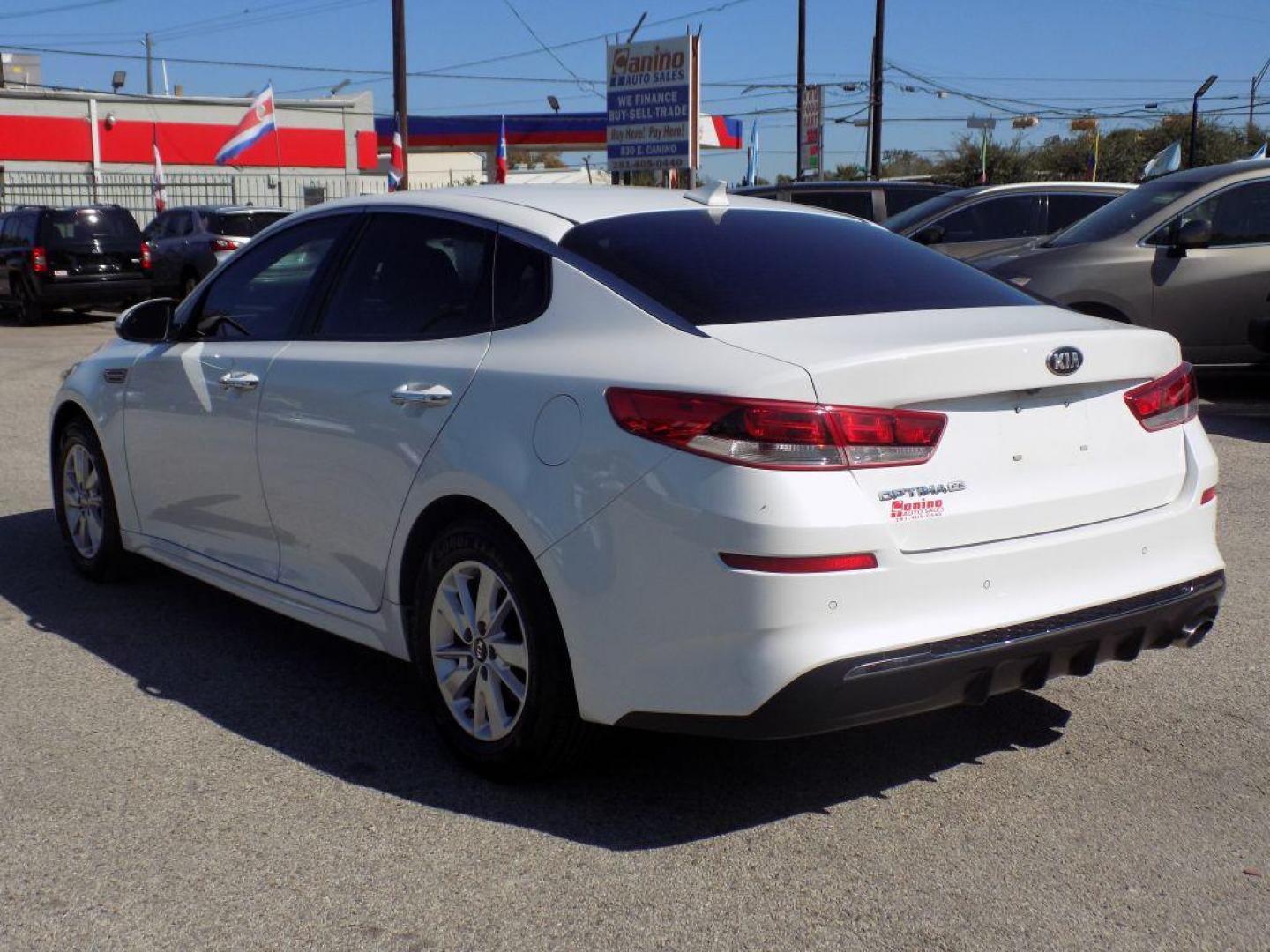 2019 WHITE KIA OPTIMA LX (5XXGT4L3XKG) with an 2.4L engine, Automatic transmission, located at 830 E. Canino Rd., Houston, TX, 77037, (281) 405-0440, 38.358219, -81.729942 - Photo#4
