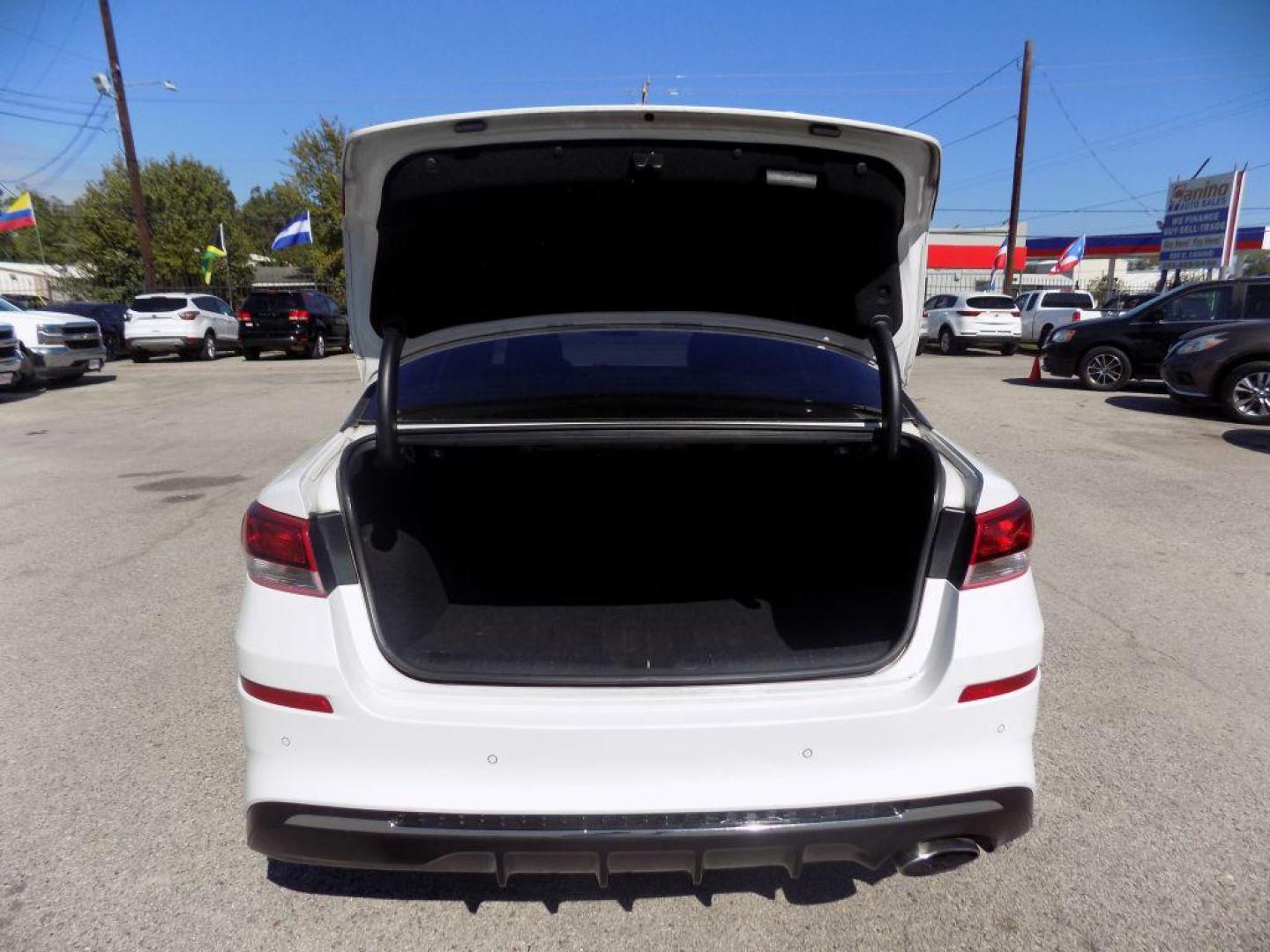2019 WHITE KIA OPTIMA LX (5XXGT4L3XKG) with an 2.4L engine, Automatic transmission, located at 830 E. Canino Rd., Houston, TX, 77037, (281) 405-0440, 38.358219, -81.729942 - Photo#7