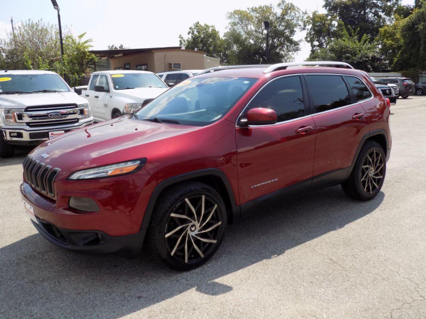 2016 RED JEEP CHEROKEE LATITUDE (1C4PJLCB9GW) with an 2.4L engine, Automatic transmission, located at 830 E. Canino Rd., Houston, TX, 77037, (281) 405-0440, 38.358219, -81.729942 - Photo#1