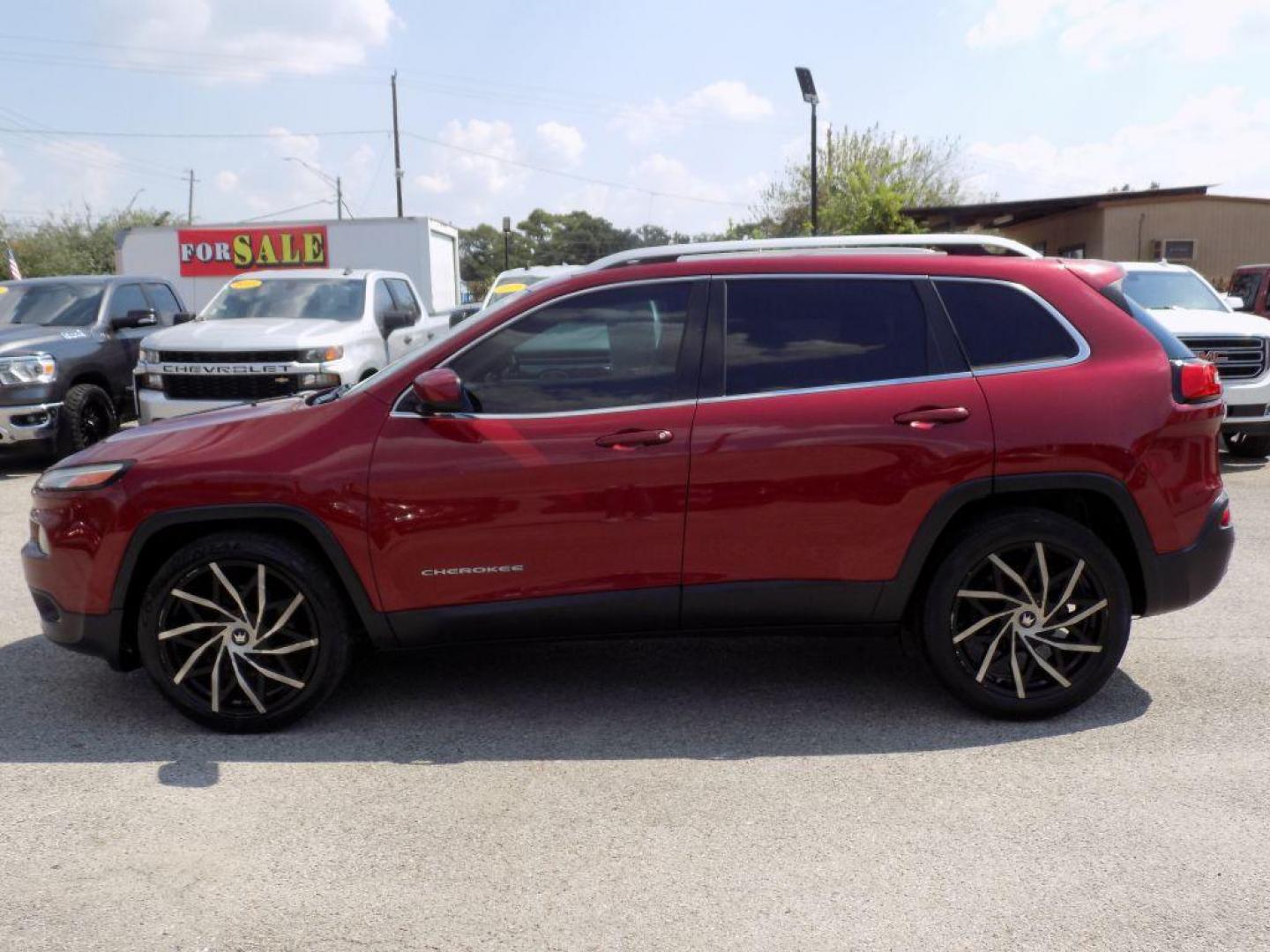 2016 RED JEEP CHEROKEE LATITUDE (1C4PJLCB9GW) with an 2.4L engine, Automatic transmission, located at 830 E. Canino Rd., Houston, TX, 77037, (281) 405-0440, 38.358219, -81.729942 - Photo#2