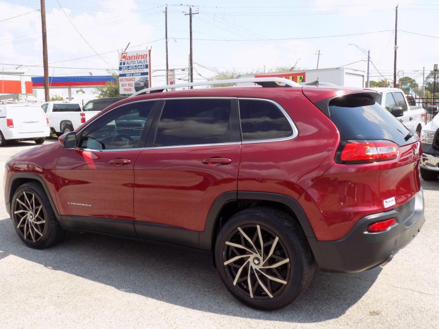 2016 RED JEEP CHEROKEE LATITUDE (1C4PJLCB9GW) with an 2.4L engine, Automatic transmission, located at 830 E. Canino Rd., Houston, TX, 77037, (281) 405-0440, 38.358219, -81.729942 - Photo#3